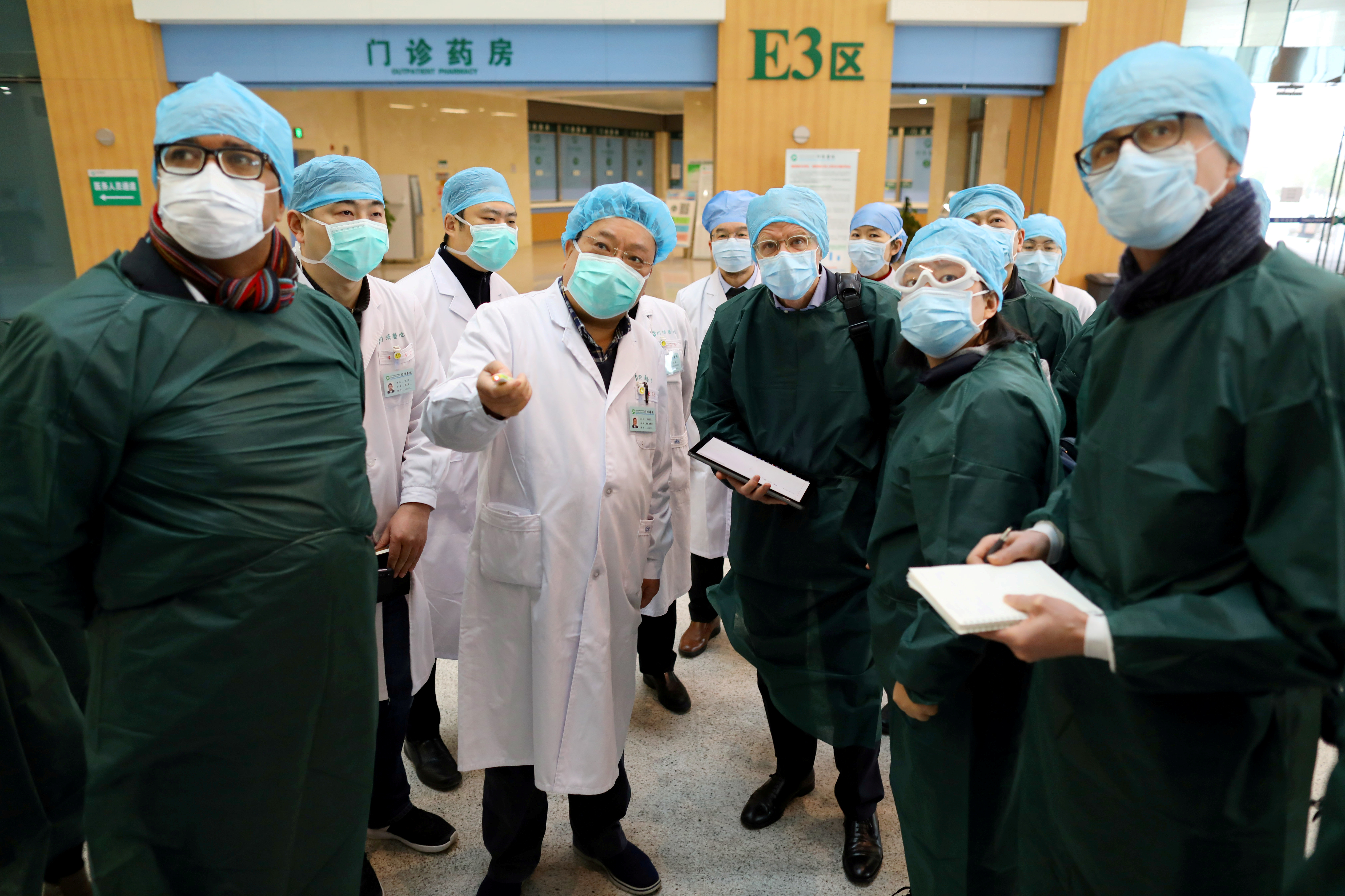 Experts from China and the WHO visit a hospital in Wuhan at the beginning of the coronavirus outbreak in 2020