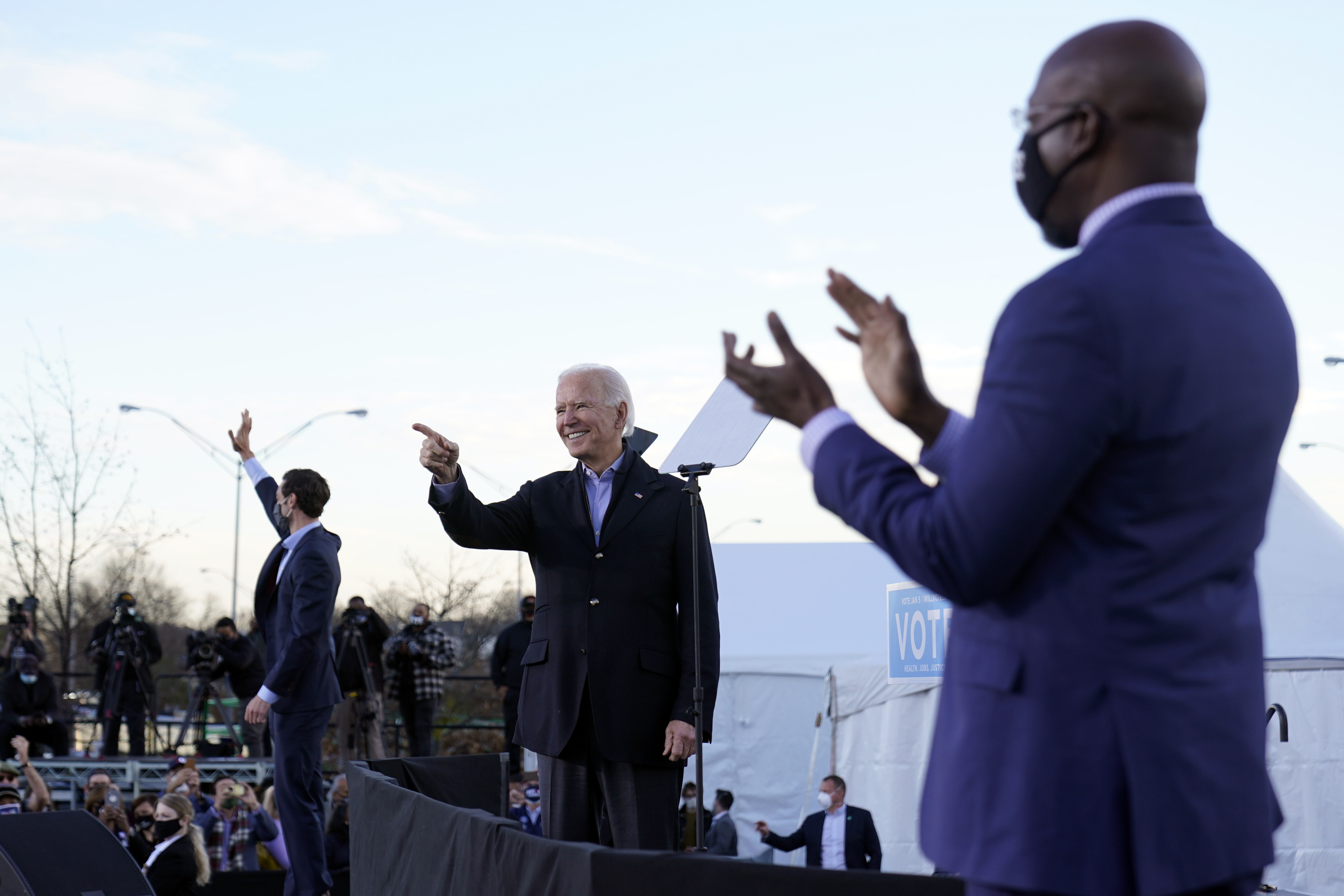 President-elect Biden said the whole nation is watching tomorrow’s US Senate elections in Georgia featuring Democratic candidates Raphael Warnock, (right), and Jon Ossoff,
