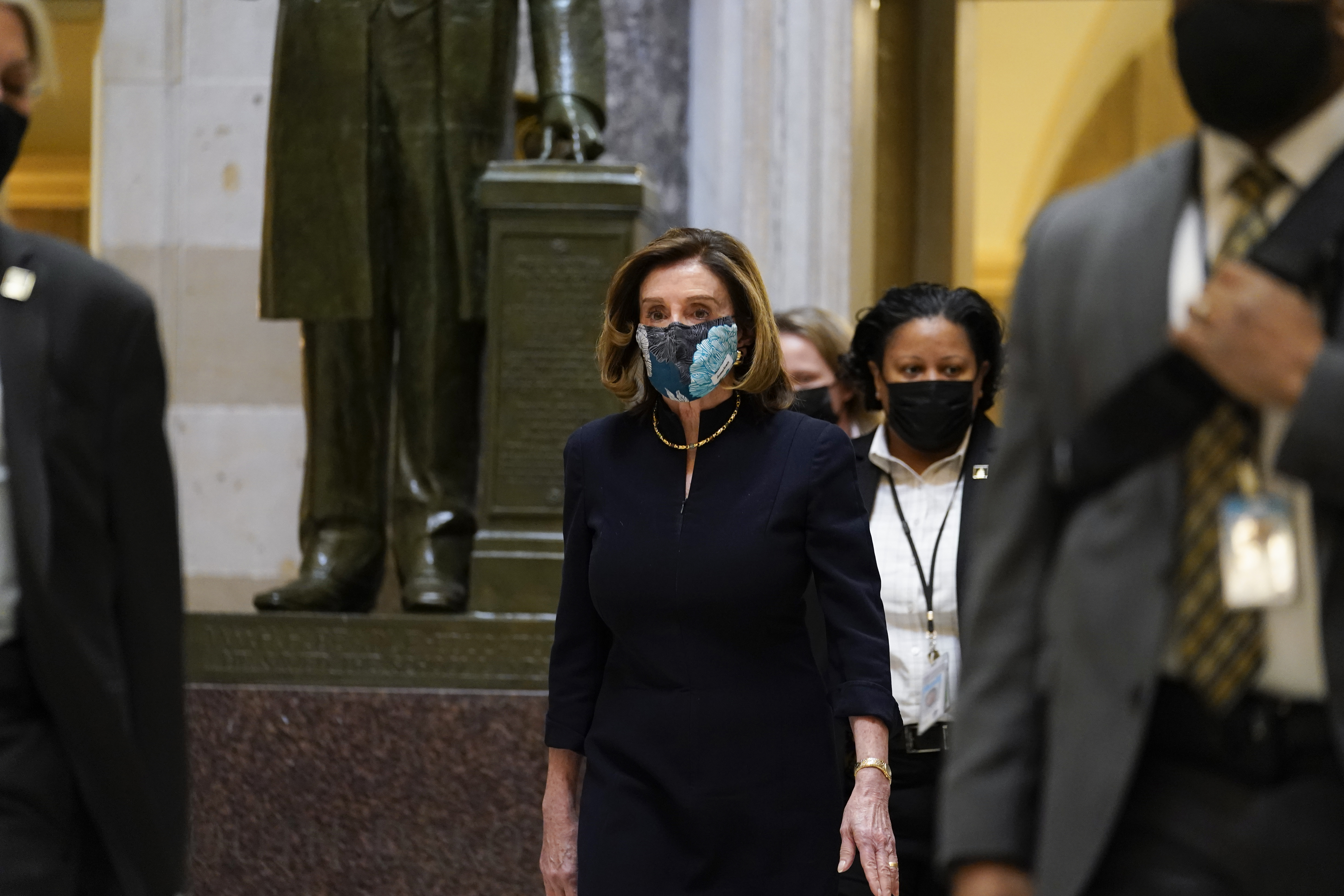 Speaker of the House Nancy Pelosi of Calif., walks through Statuary Hall on Capitol Hill in Washington, DC, Wednesday, January 13, 2021.