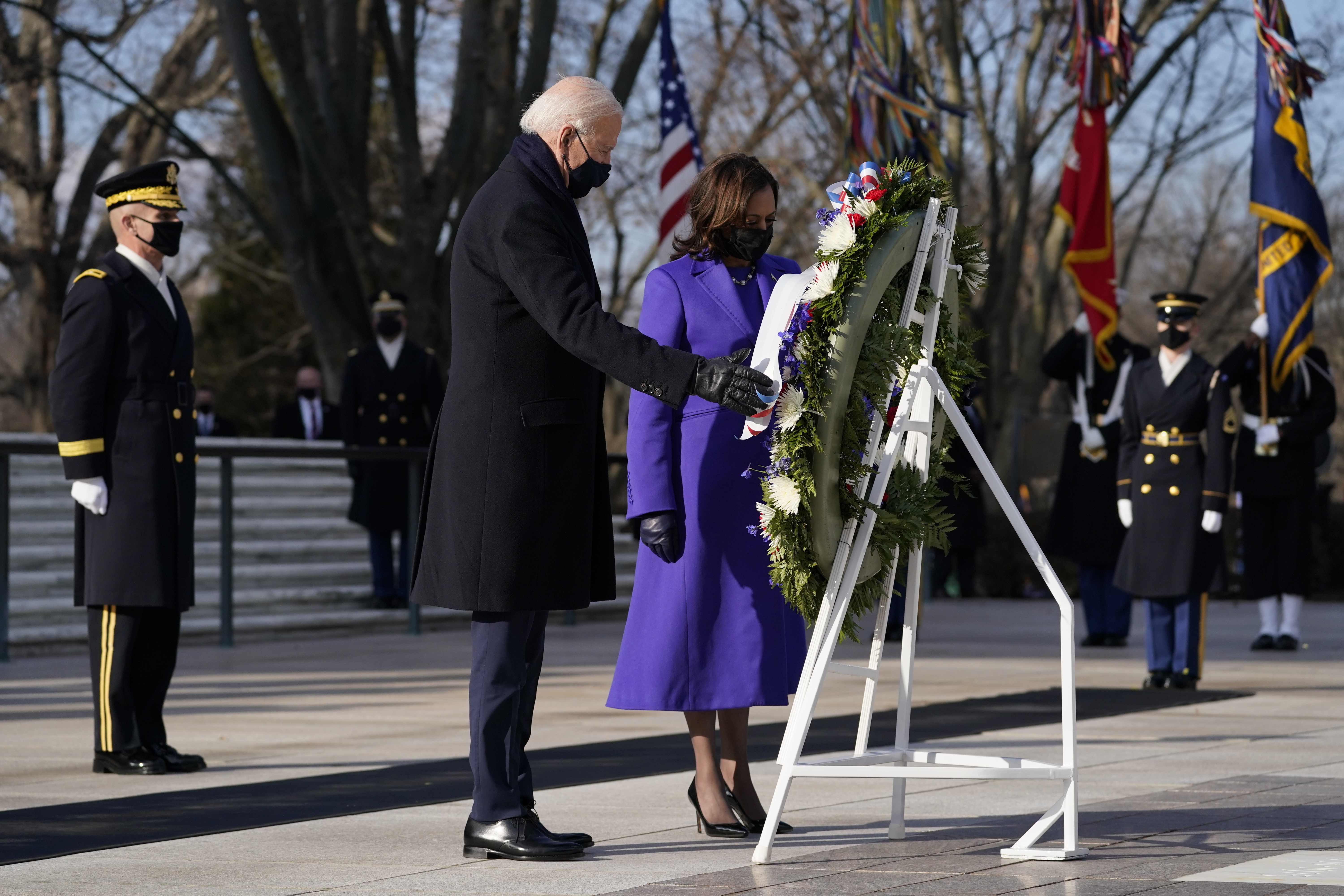 President Joe Biden and Vice President Kamala Harris participate in a wreath laying ceremony at the Tomb of the Unknown Soldier at Arlington National Cemetery