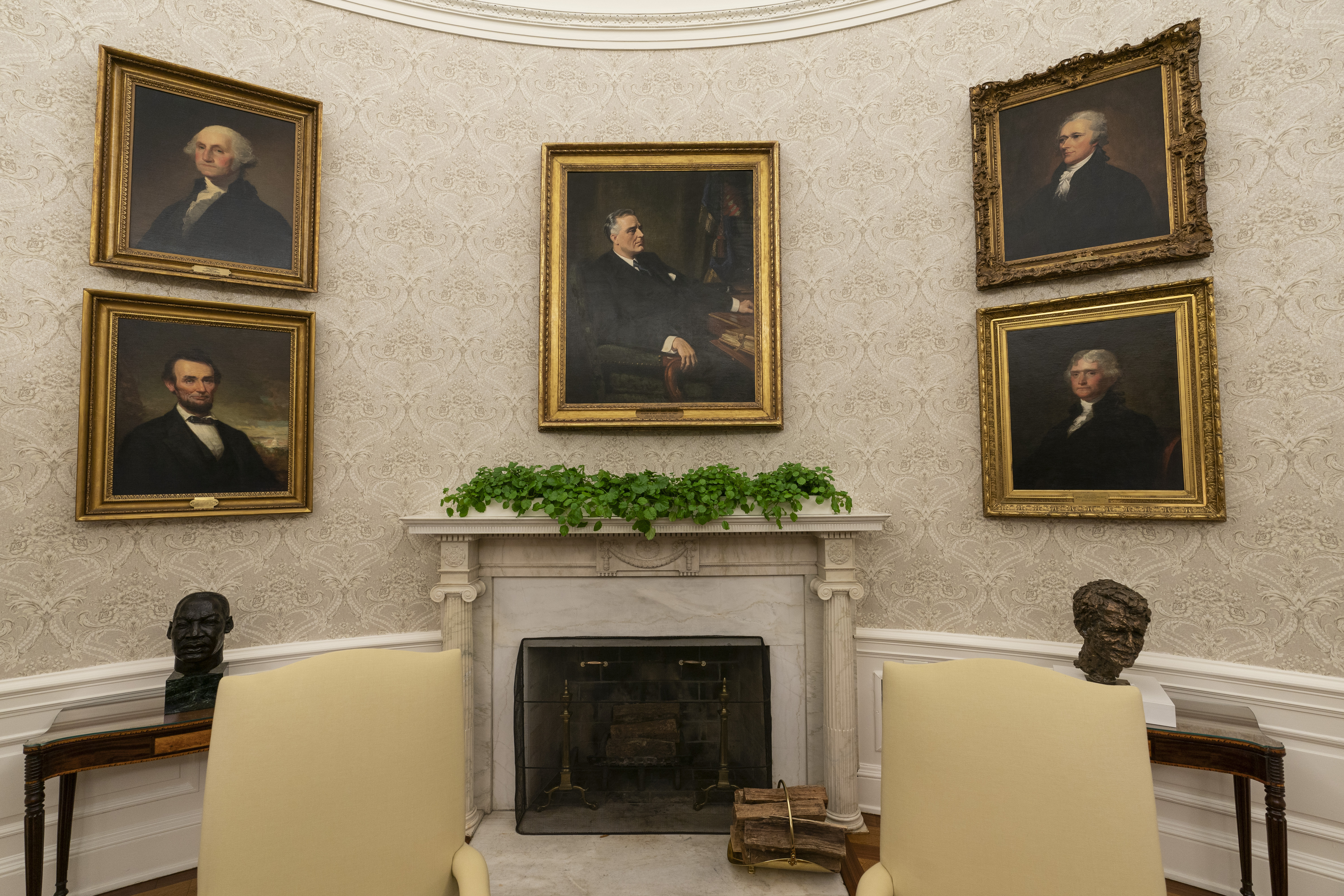 The Oval Office of the White House is newly redecorated for the first day of President Joe Biden’s administration, including a pairing of former President Franklin D Roosevelt over the mantle of the fireplace.