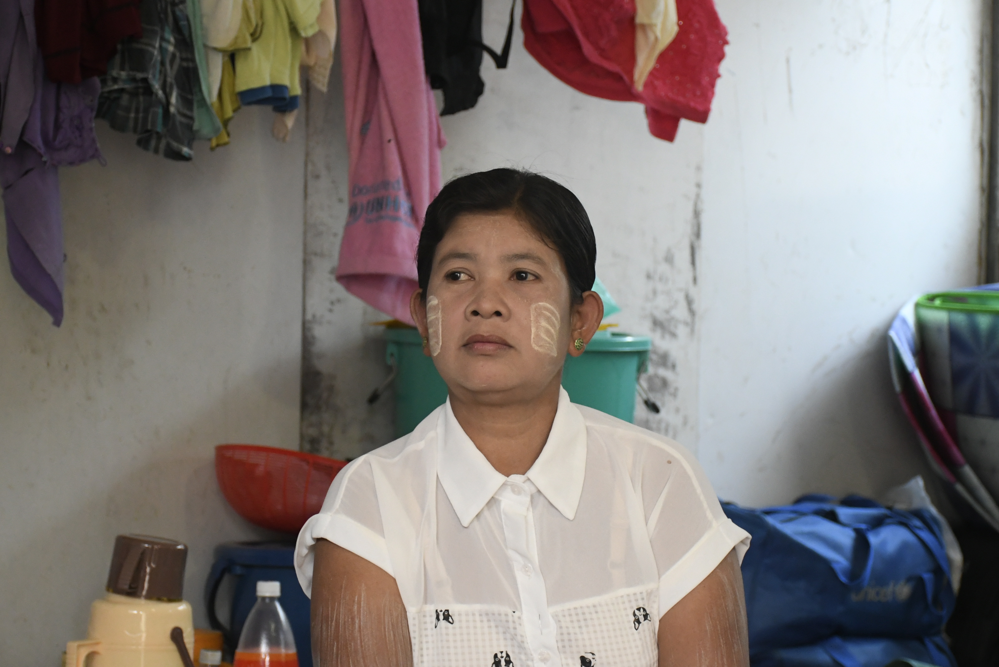 A woman whose husband and two family members have been missing since they were arrested in March. She now lives in a displacement camp on a monastery compound in the Rakhine State capital