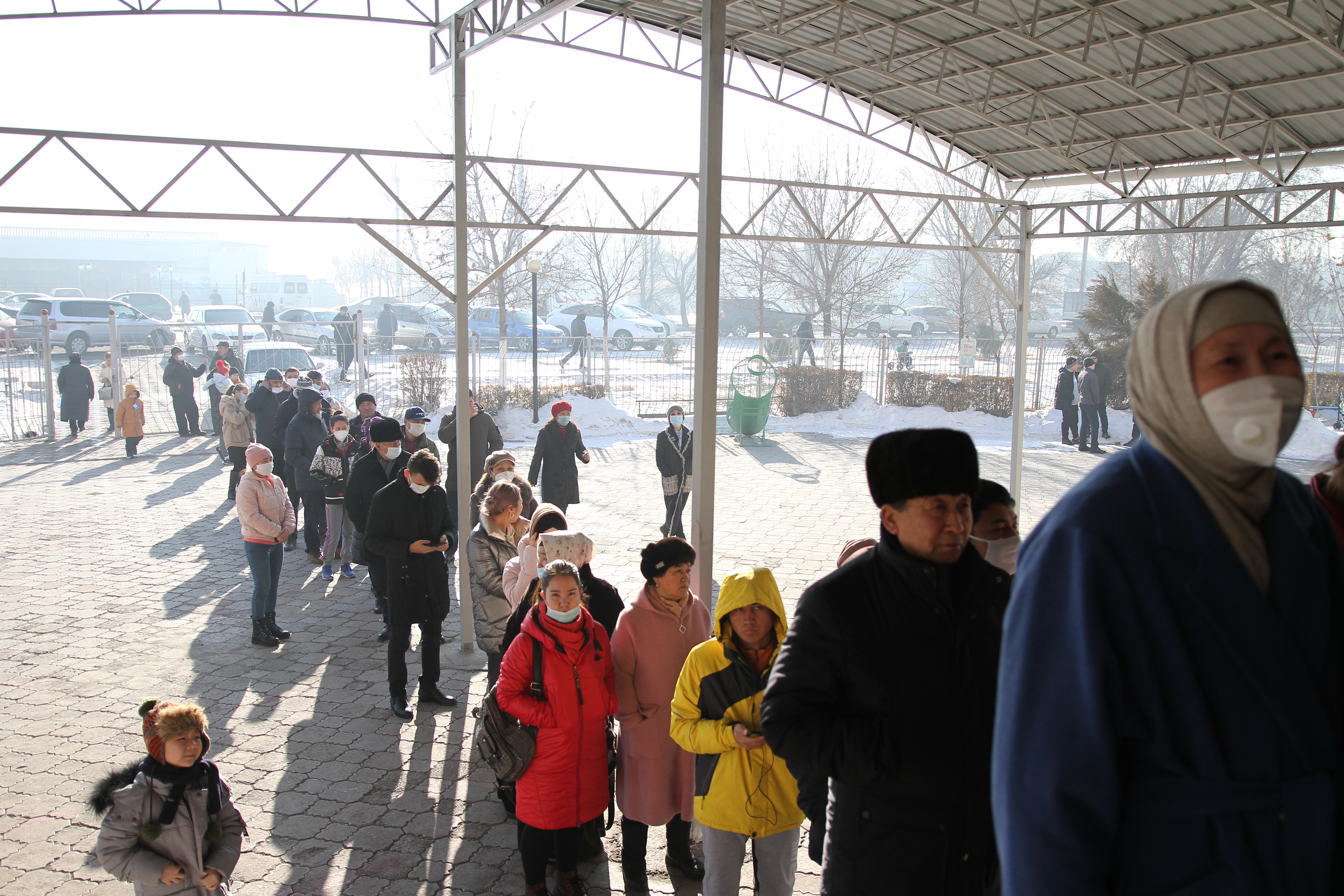 People waiting to cast their ballot at a polling station in Ak-Orgo area