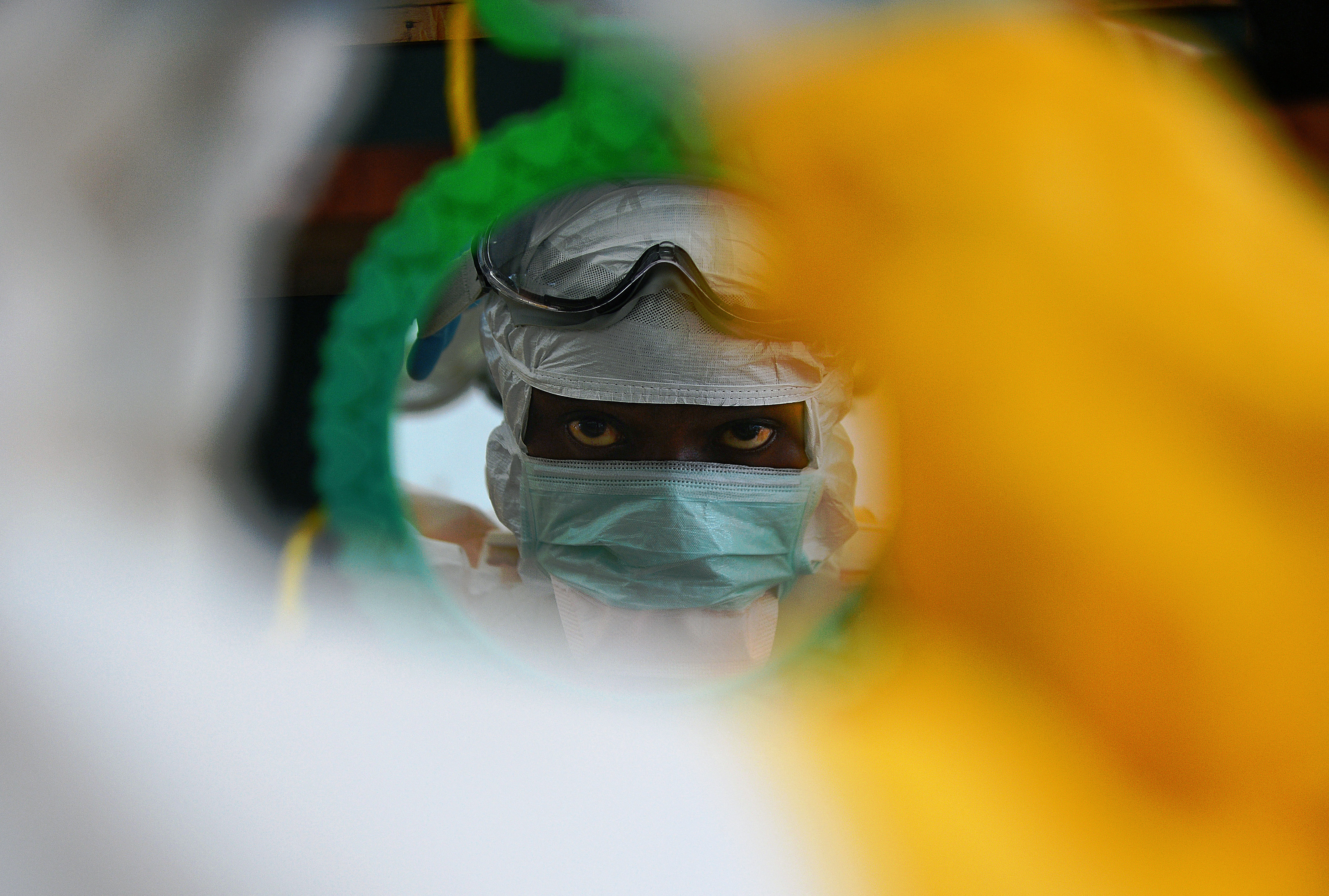 This file photo taken on August 15, 2014 shows an MSF medical worker