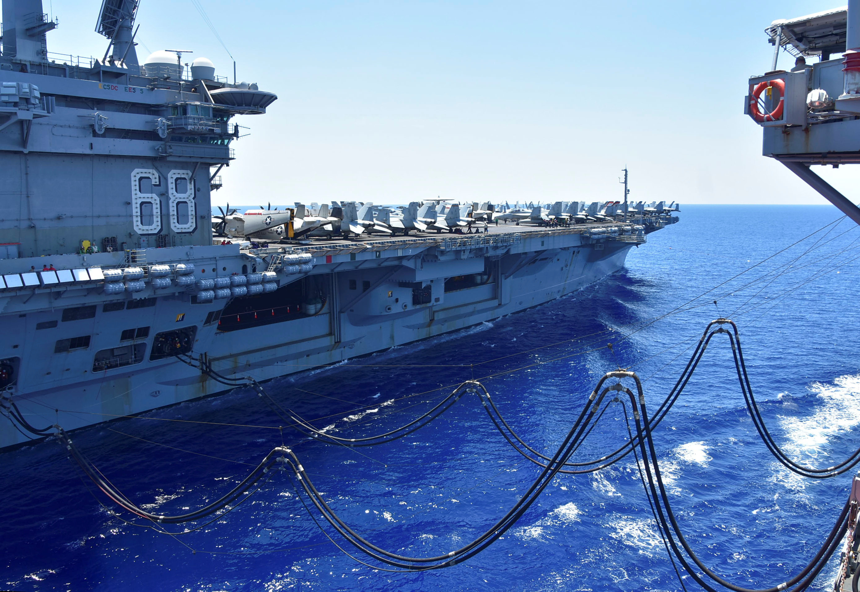 The U.S. Navy aircraft carrier USS Nimitz receives fuel from the Henry J. Kaiser-class fleet replenishment oiler USNS Tippecanoe during an underway replenishment in the South China Sea July 7, 2020. Picture taken July 7, 2020. U.S. Navy/Christopher Bosch/Handout via REUTERS. THIS IMAGE HAS BEEN SUPPLIED BY A THIRD PARTY.