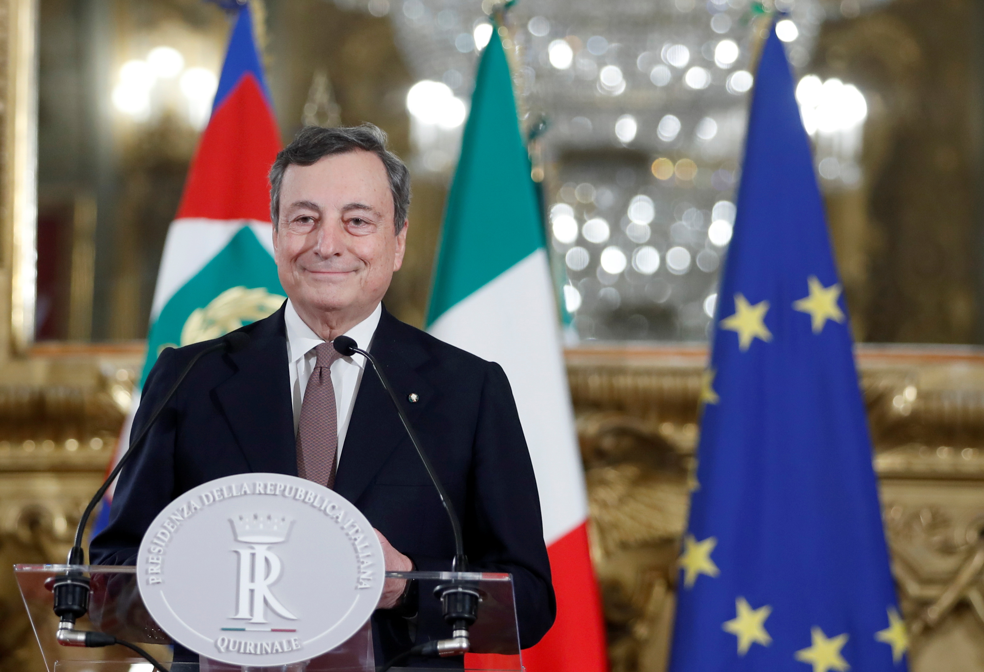 Italy's new Prime Minister Mario Draghi speaks to the media after meeting with Italian President Sergio Mattarella, in Rome, Italy, February 12, 2021 [Yara Nardi/Reuters]