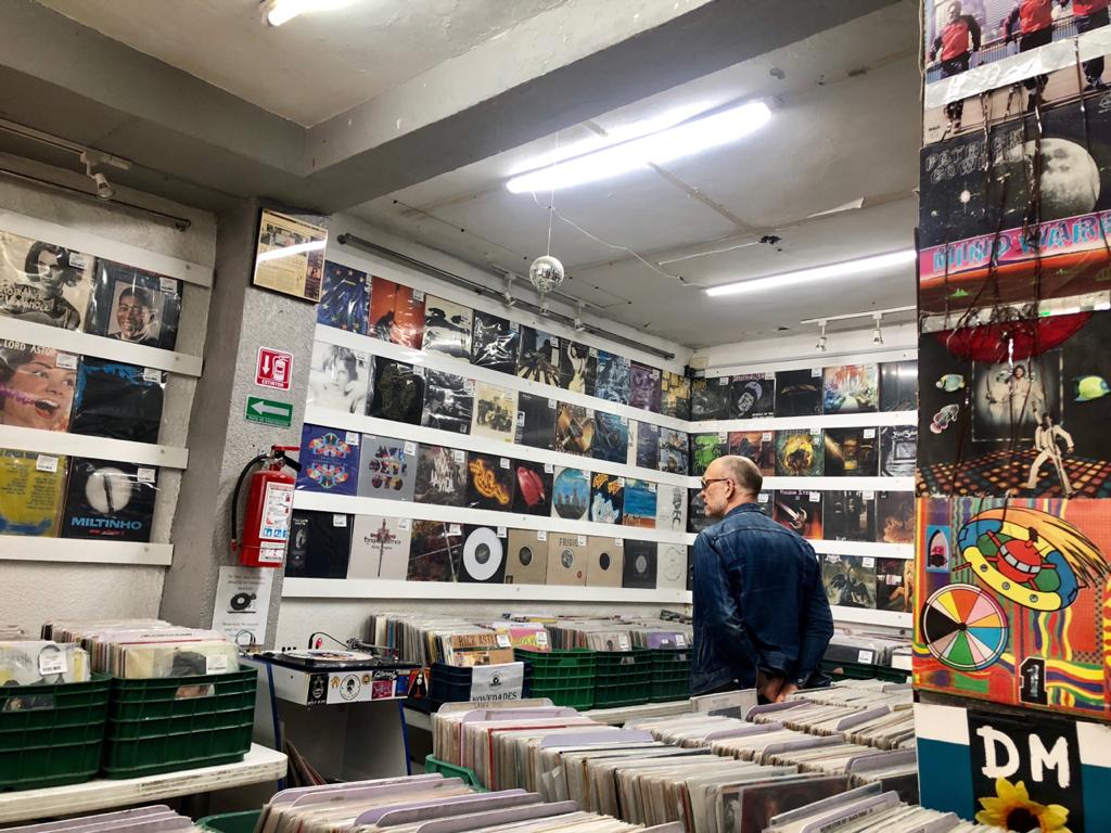 The writer shopping for vinyl records in Mexico City [Photo courtesy of Charles Leonard]
