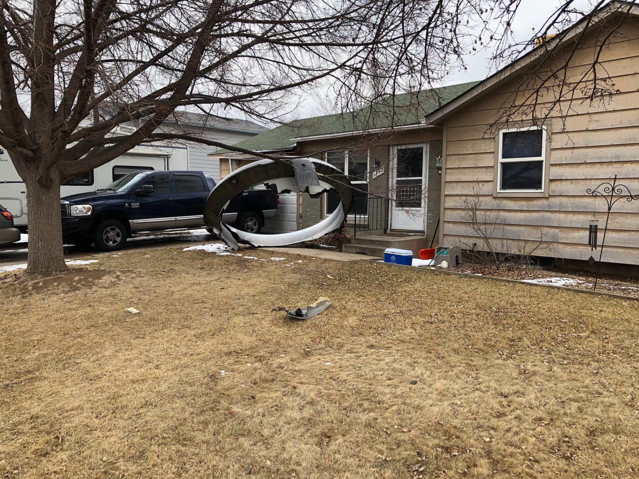 Parts of the shattered engine from United Airlines flight 328 landed in the suburb of Broomfield, Colorado