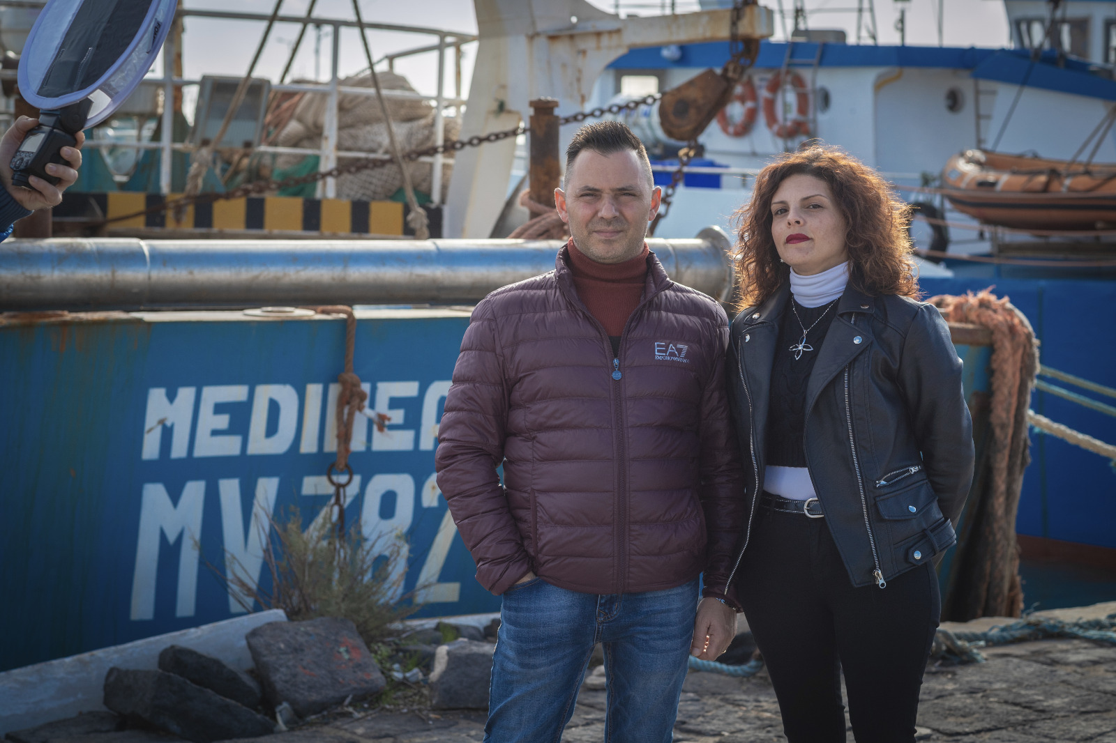 Bernardo Salvo and his wife Cristina Amabilino next to the Medinea, the vessel aboard which he was captured in September