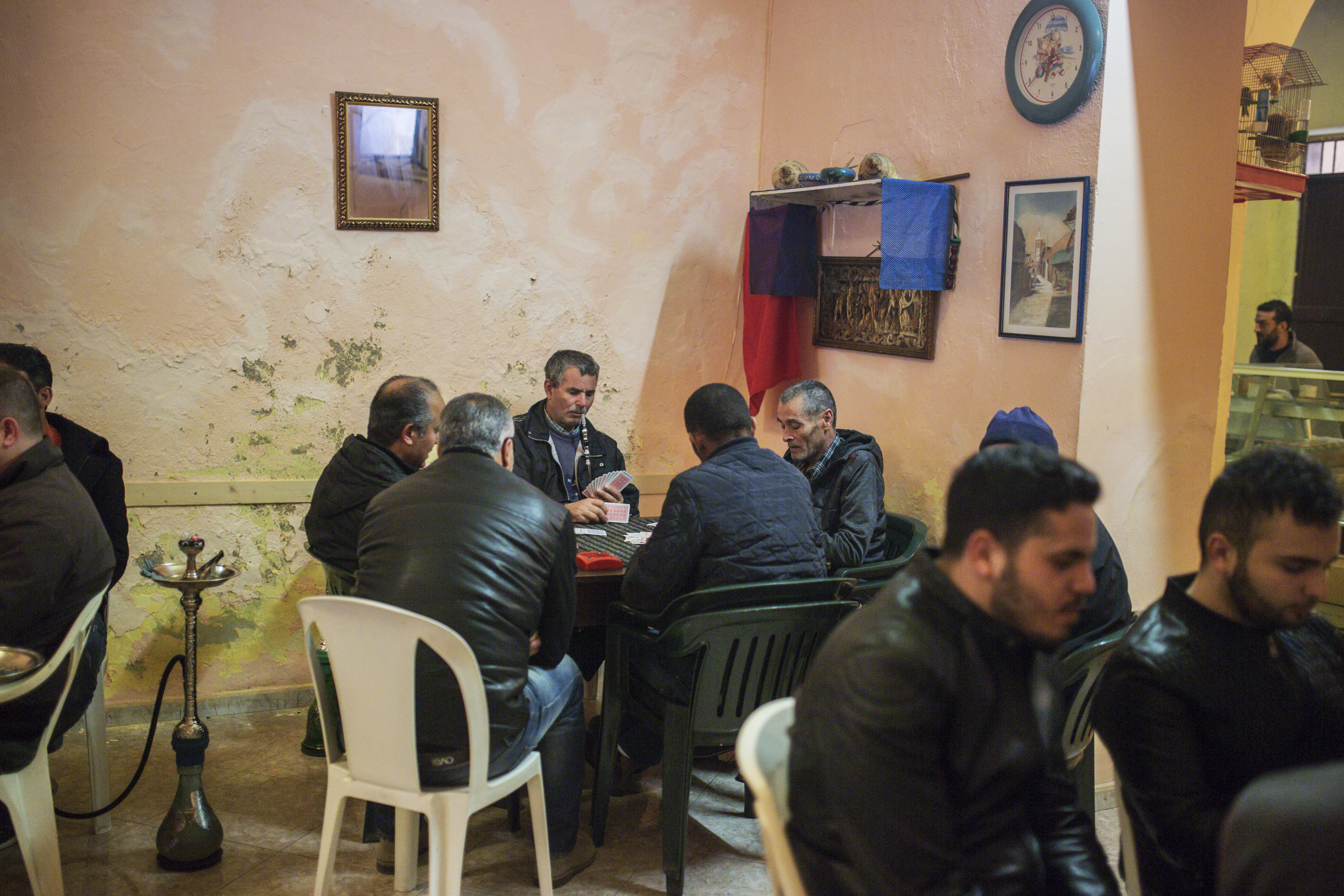 A bar where Italian and Tunisian fishermen meet to chat, drink and play after work in Mazara