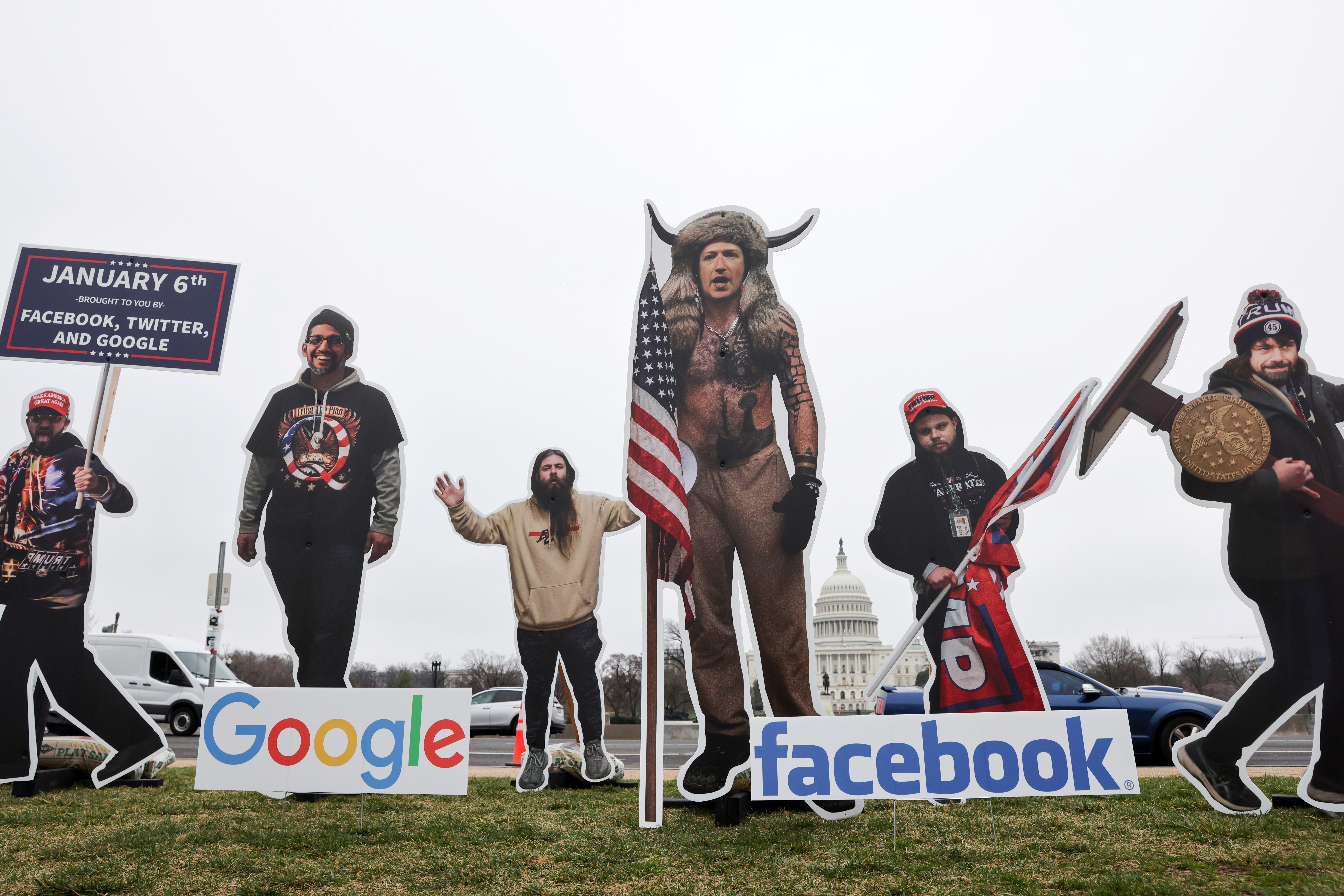 An art installation protest by the organisation SumOfUs portrays Google CEO Sundar Pichai, Twitter CEO Jack Dorsey and Facebook CEO Mark Zuckerberg as January 6th rioters on the National Mall