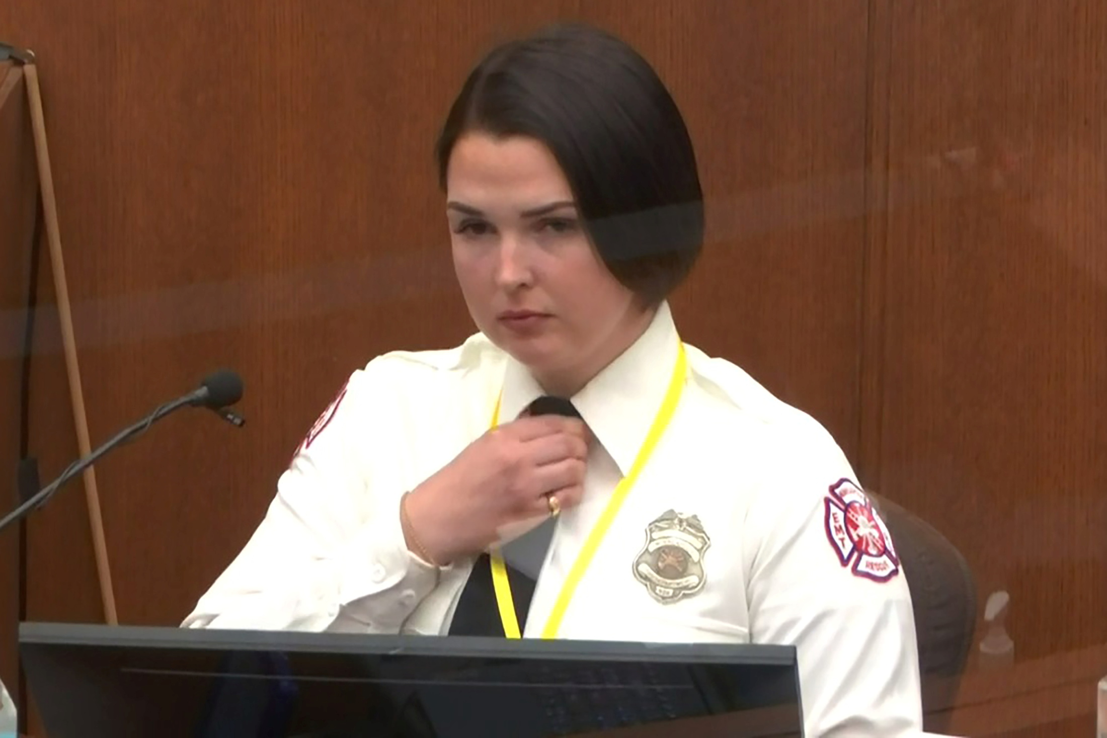 Fire department emergency medical technician (EMT) Genevieve Hansen told the court at the murder trial of former police officer Derek Chauvin that her offers of assistance had been rebuffed [Pool via Reuters]