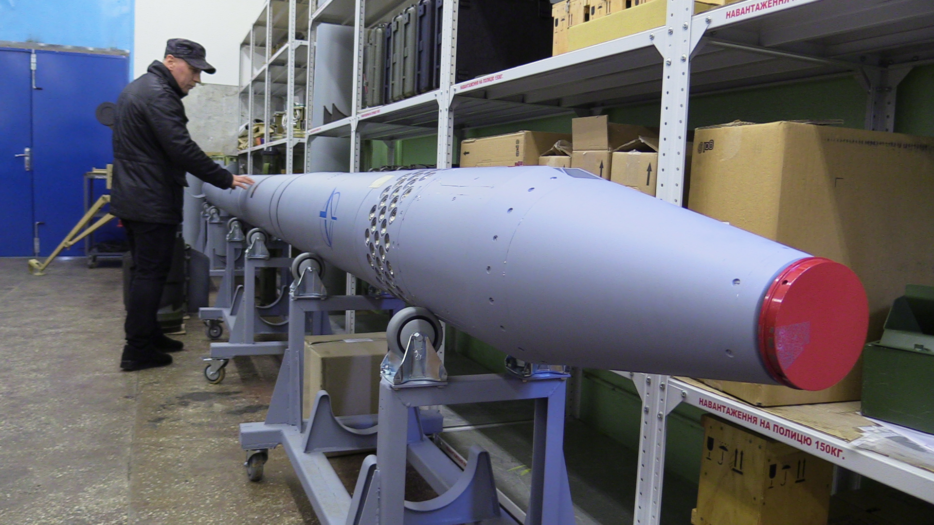 A staffer of the Luch Design Bureau in Kyiv examines a Vilkha missile