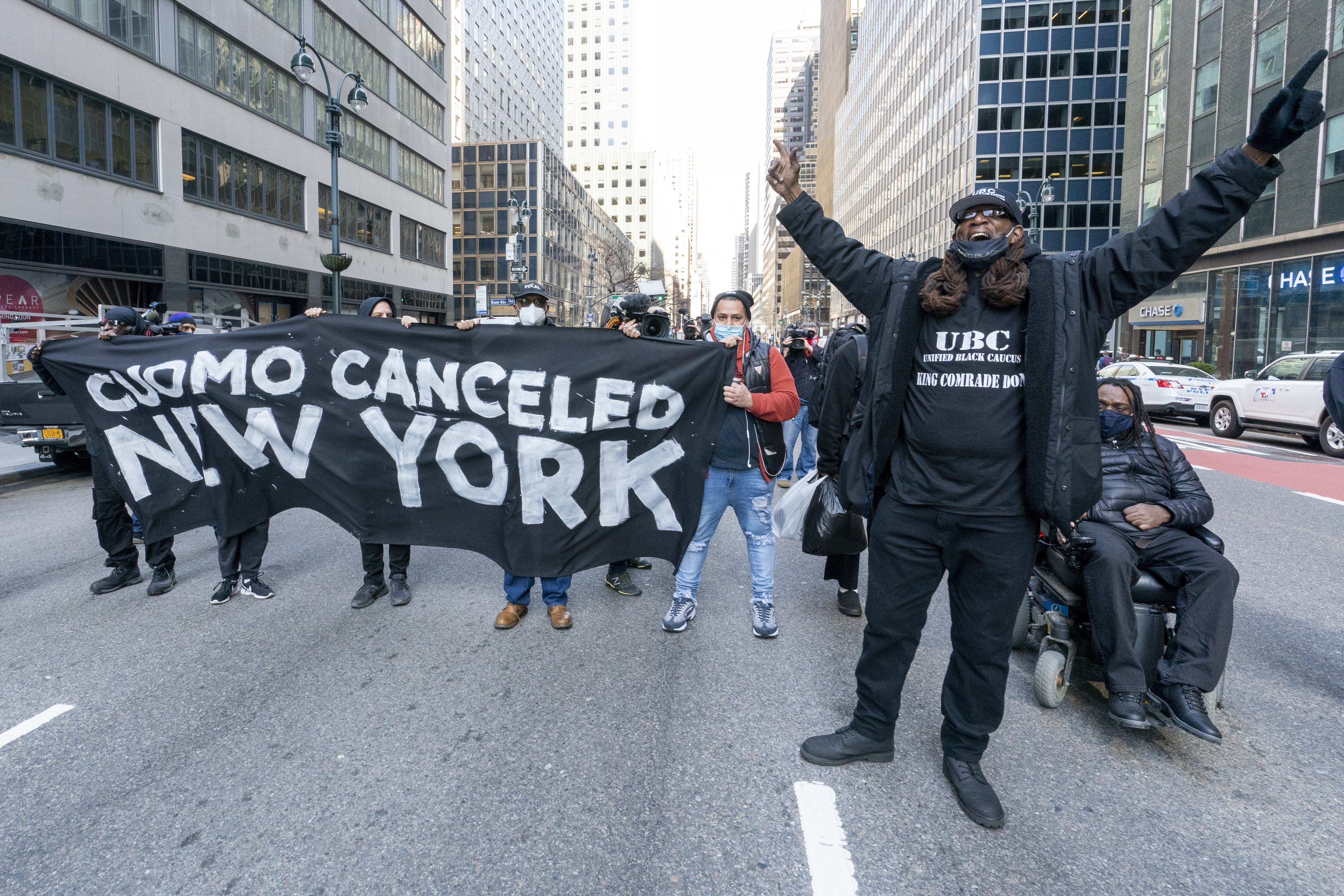 Activists with VOCAL-NY block traffic on 3rd Avenue outside New York Governor Andrew Cuomo’s office, on March 10, 2021, demanding his immediate resignation and a state budget that funds housing, healthcare and economic relief for common people