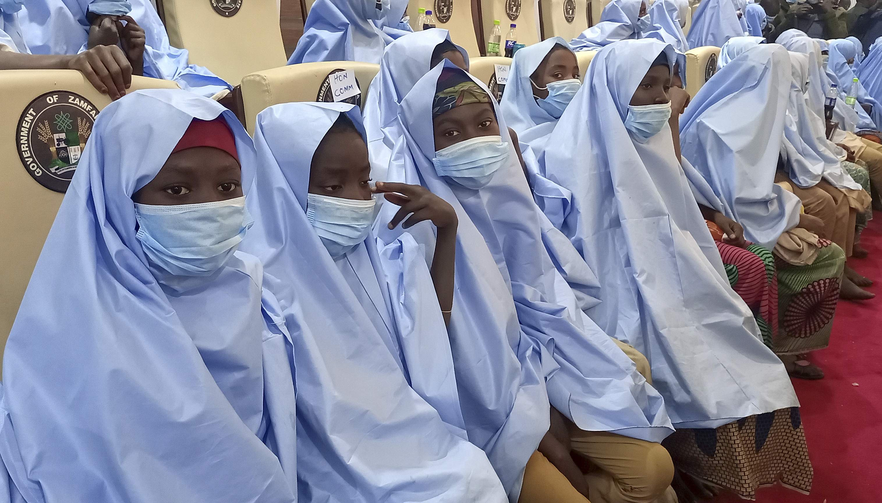 Kidnapped students look on after their release in Zamfara, Nigeria, on March 2