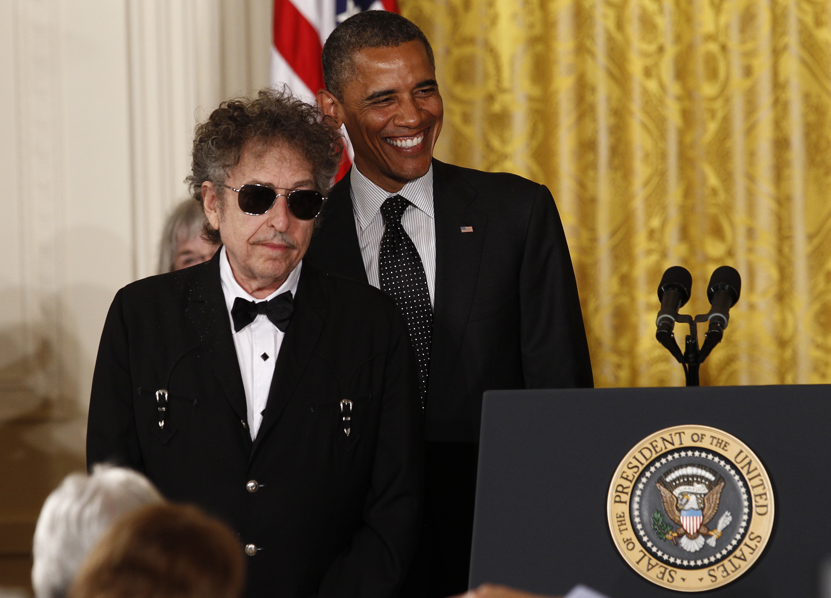 Musicians such as Bob Dylan, left, have seen a surge in streaming demand for their songs during the coronavirus pandemic [File: Kevin Lamarque/Reuters)
