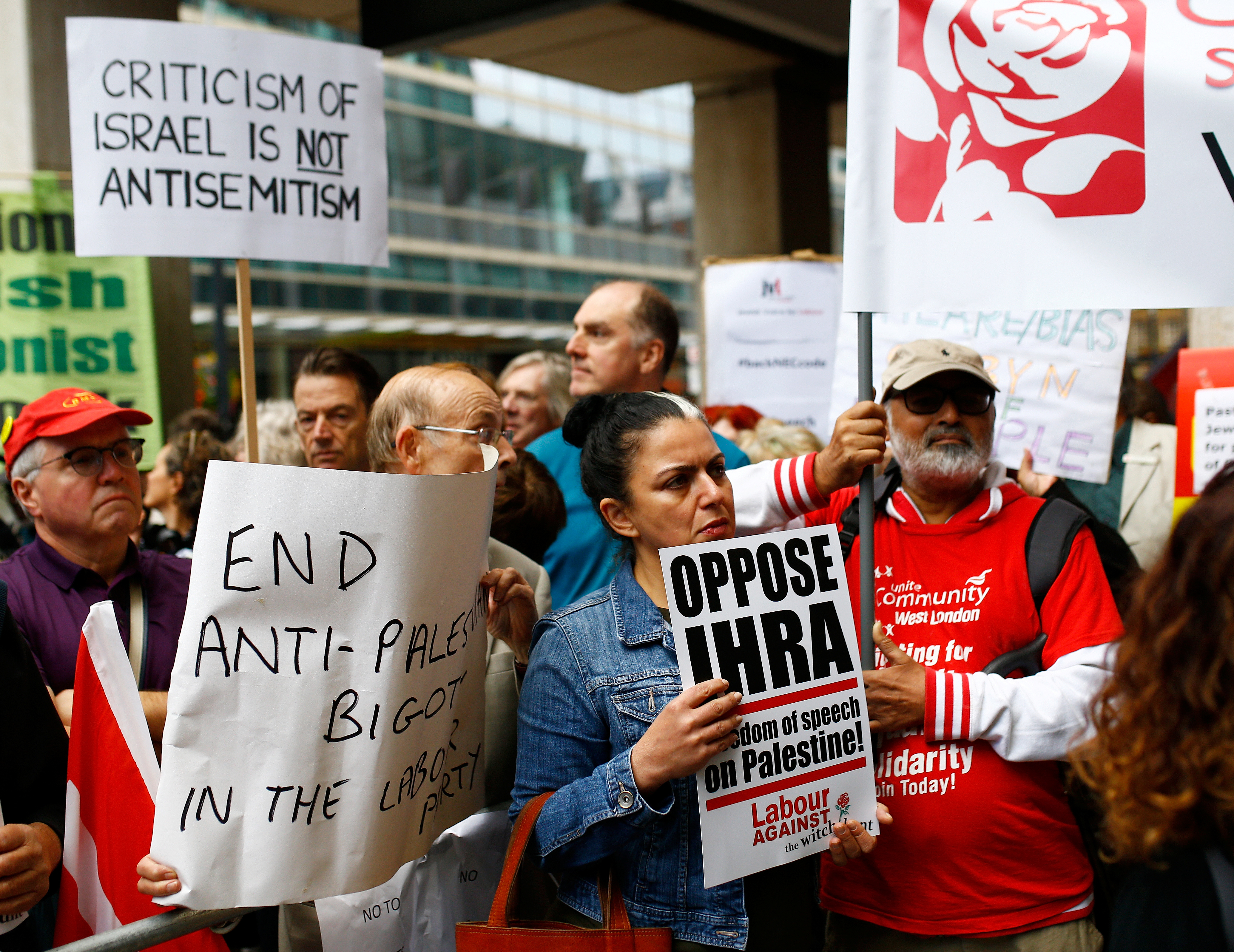 Demonstrators take part in protests outside a meeting of the Labour Party during the party's discussion of the definition of anti-Semitism [File: Reuters/Henry Nicholls] (Reuters)