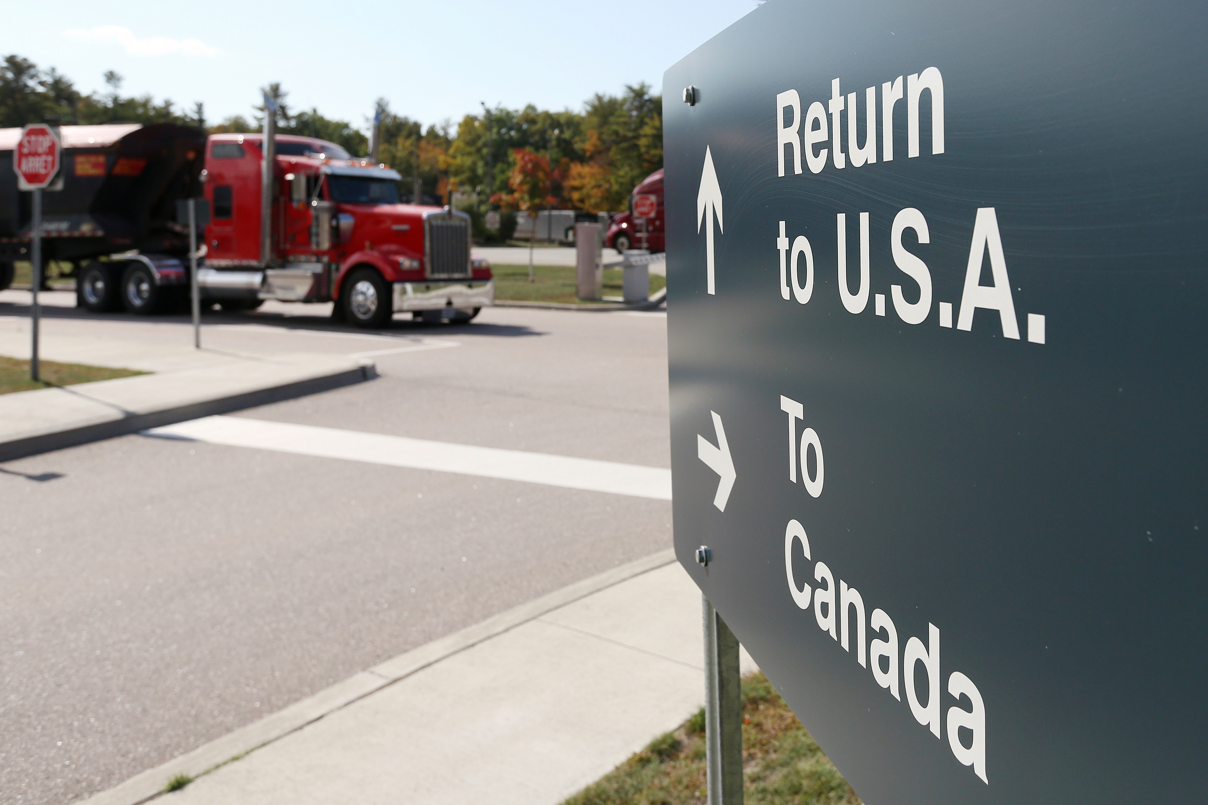 A truck leaves the Canada-US border crossing at the Thousand Islands Bridge in Lansdowne, Ontario in September 2020