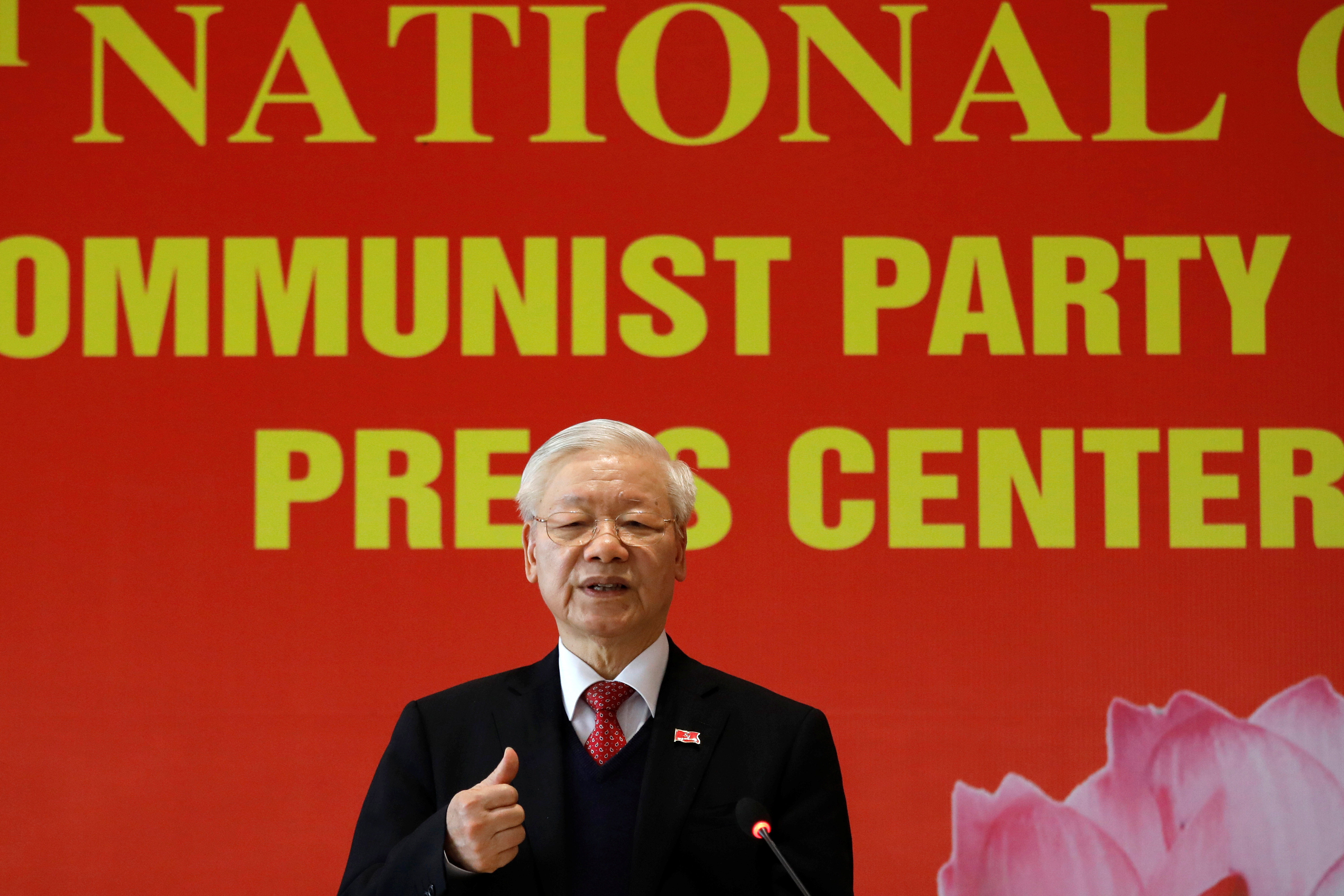 Nguyen Phu Trong speaks at a news conference after he is re-elected as Communist Party’s General Secretary for the 3rd term after the closing ceremony of 13th national congress of the ruling communist party in Hanoi, Vietnam February 1, 2021