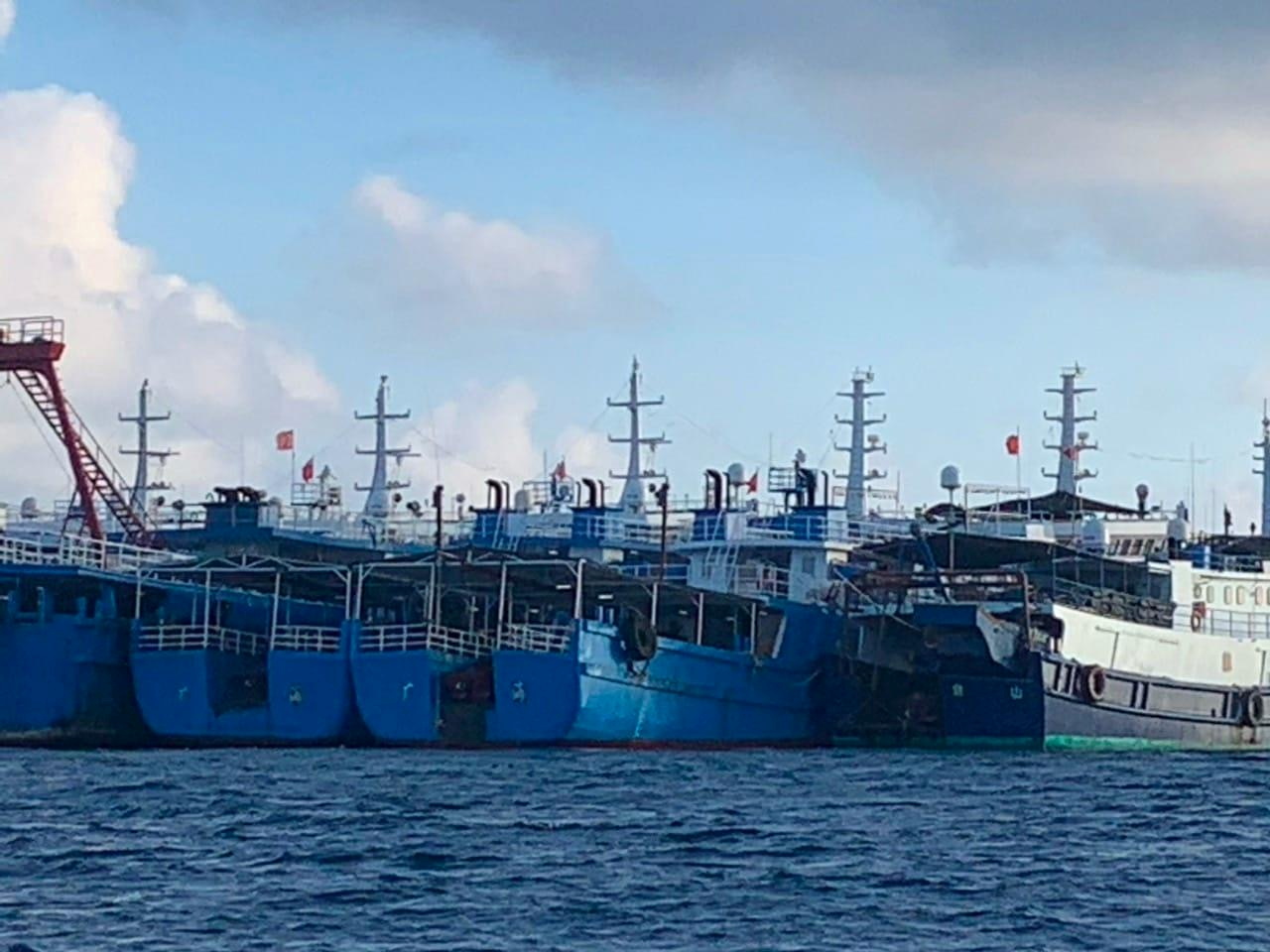 Chinese vessels, believed to be crewed by Chinese maritime militia personnel, were seen on Saturday at Whitsun Reef, which is within the Philippines’s exclusive economic zone [Philippine Coast Guard viat Reuters]