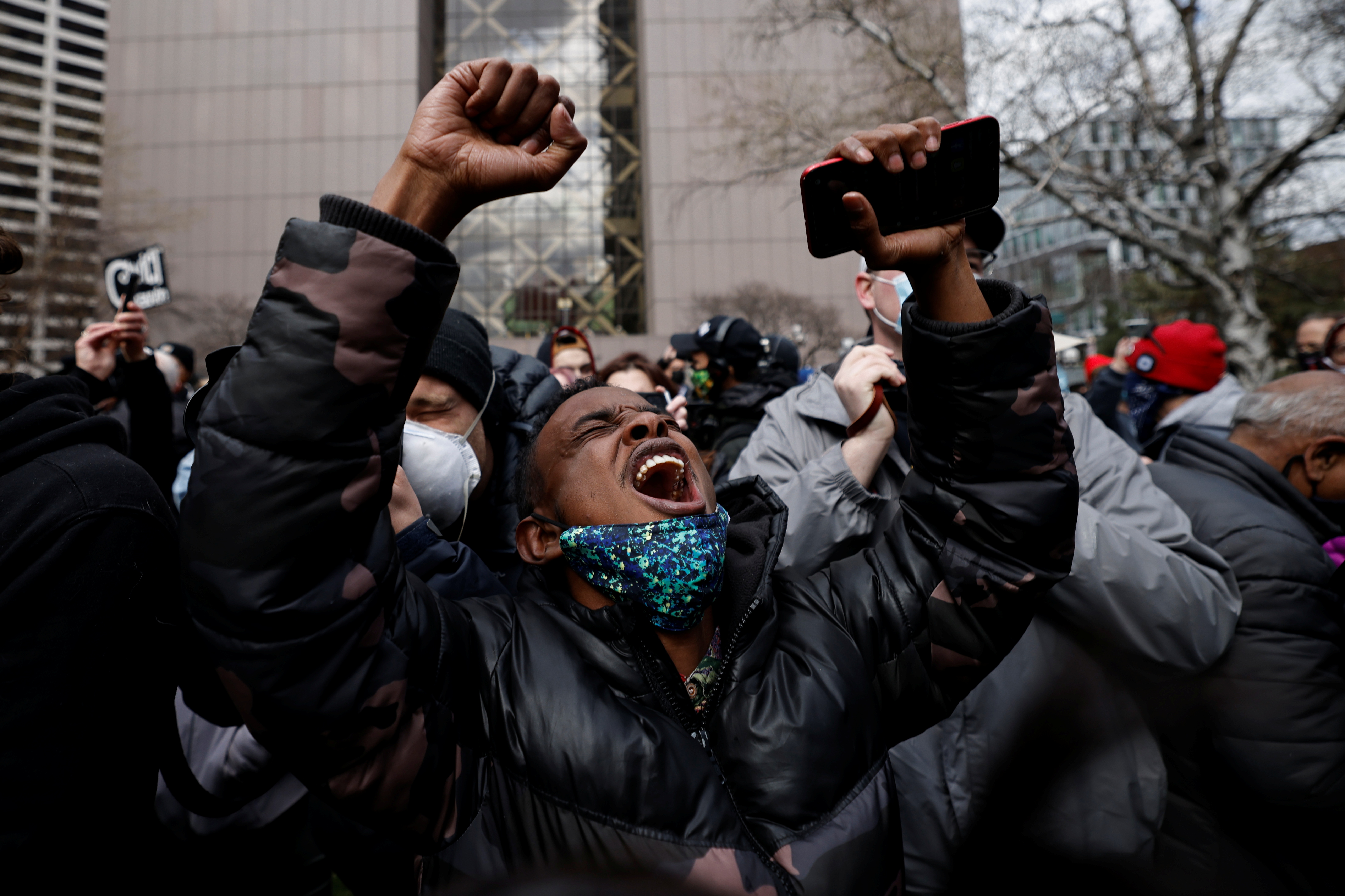A person reacts after the verdict in the trial of former Minneapolis police officer Derek Chauvin, in the death of George Floyd, in front of Hennepin County Government Center, in Minneapolis, Minnesota, US, April 20, 2021