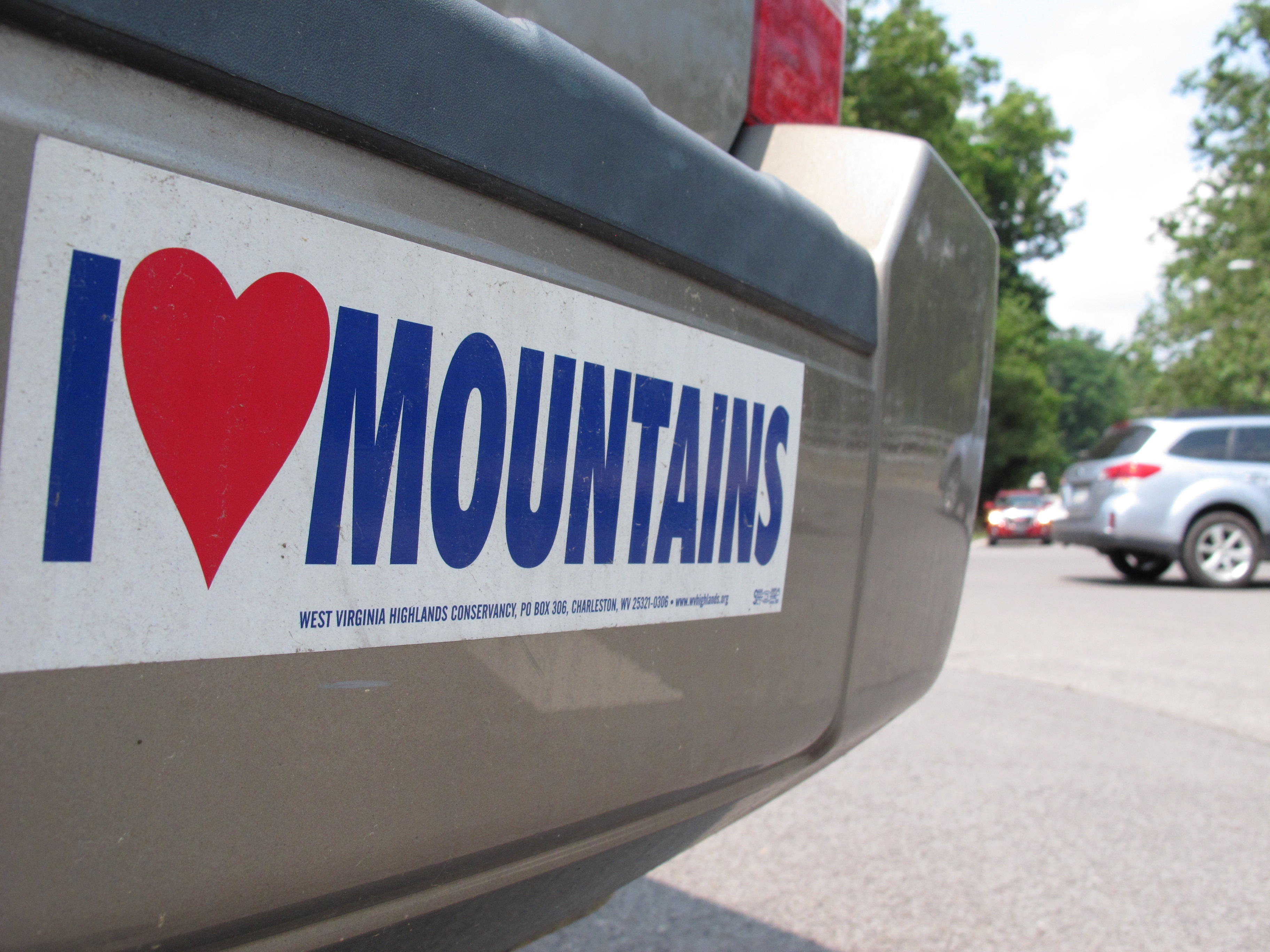 An ‘I Love Mountains’ bumper sticker adorns the car of Jordan Lovejoy, a graduate student who recently returned to her hometown of Pineville, West Virginia to help gather examples of the local dialect for an audio database being created at West Virginia University