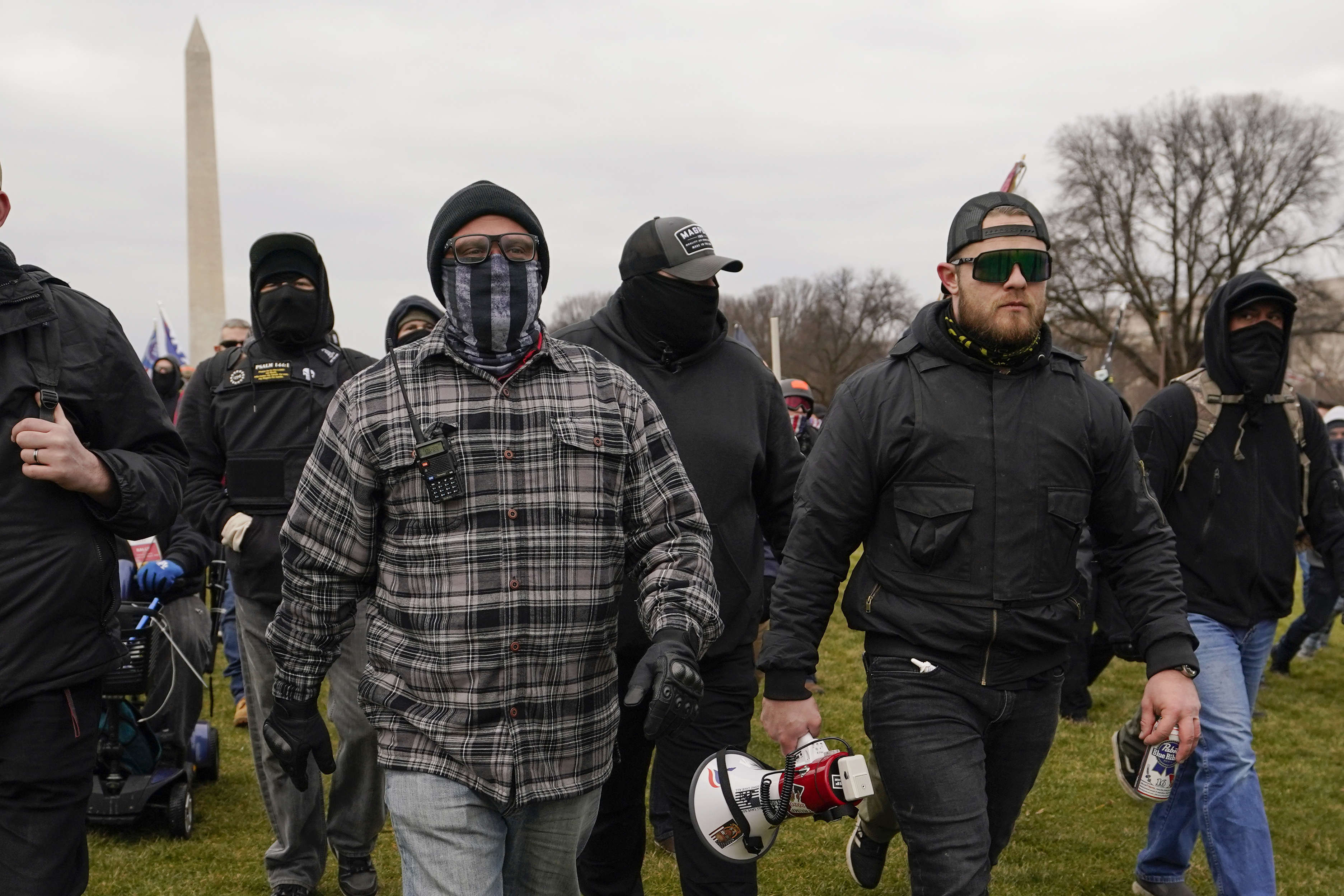 Proud Boy members walk toward the US Capitol in support of then-President Donald Trump on January 6. Several of their leaders, members and associates have become the central targets of the Justice Department’s sprawling investigation.
