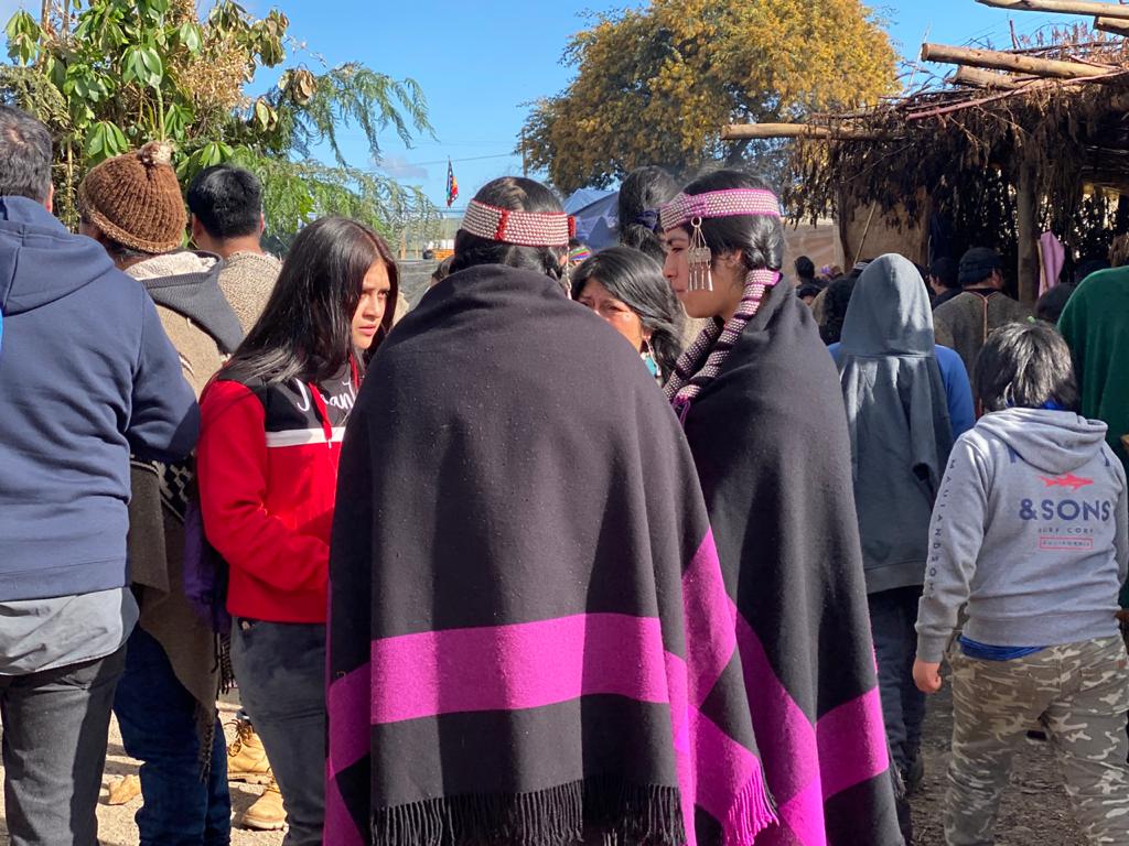 Mapuche women in traditional clothes at a Mapuche community gathering