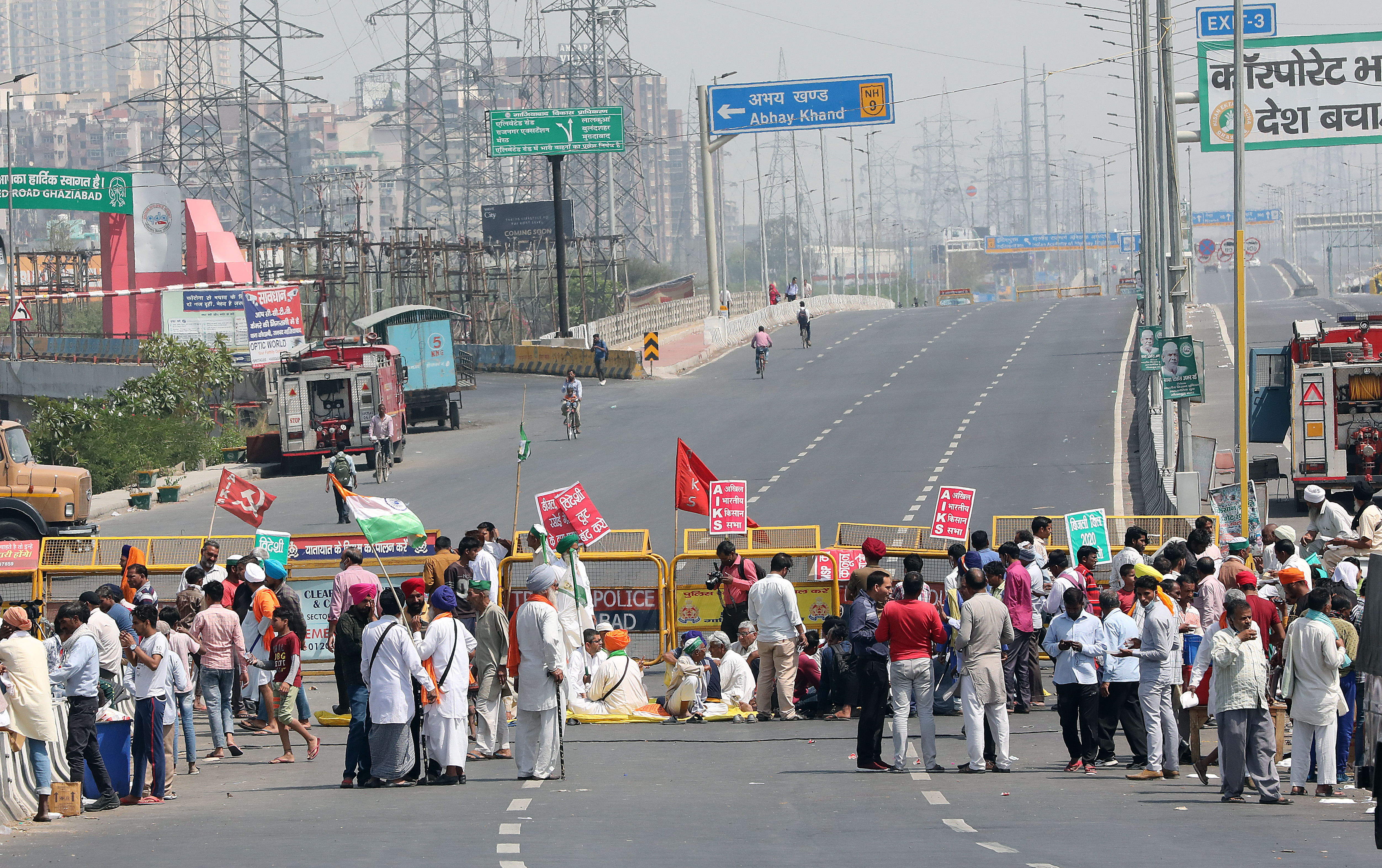 Indian farmers block a highway during a nationwide strike at the Delhi-Uttar Pradesh border last month