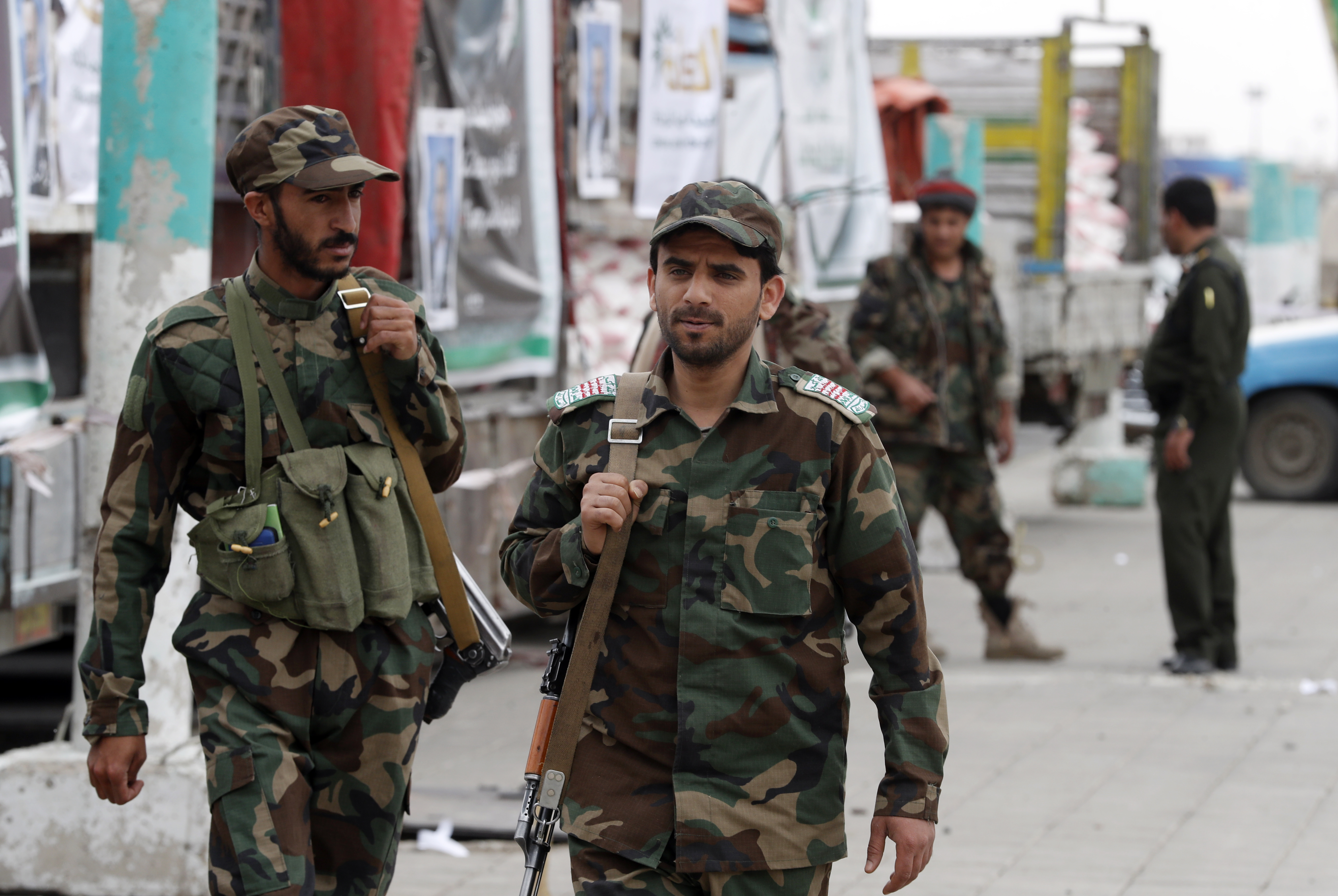 Houthi fighters patrol at a square as the fighting continues, in Sanaa, April 20, 2021