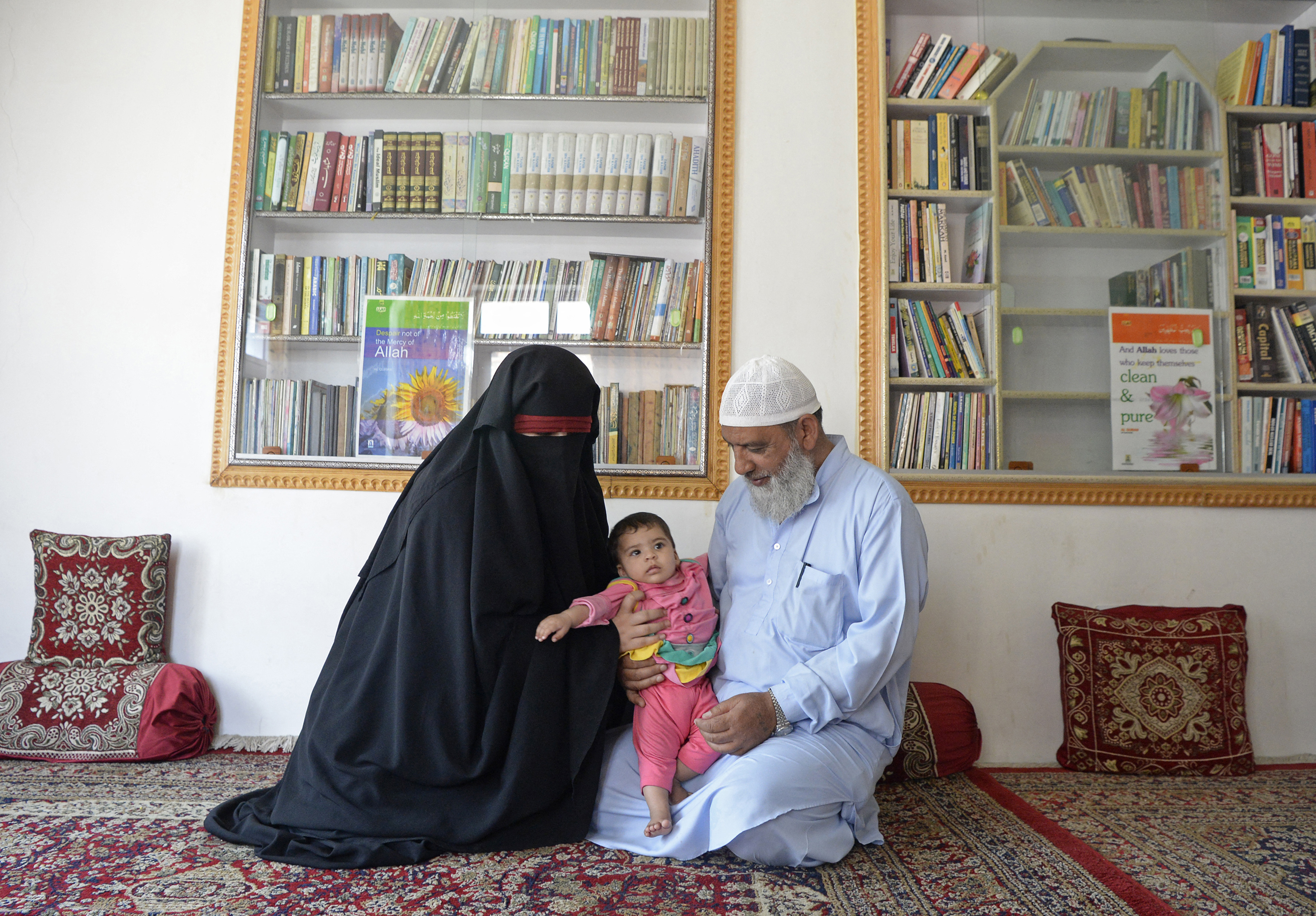 Sultan’s wife, daughter and father at their home in Srinagar