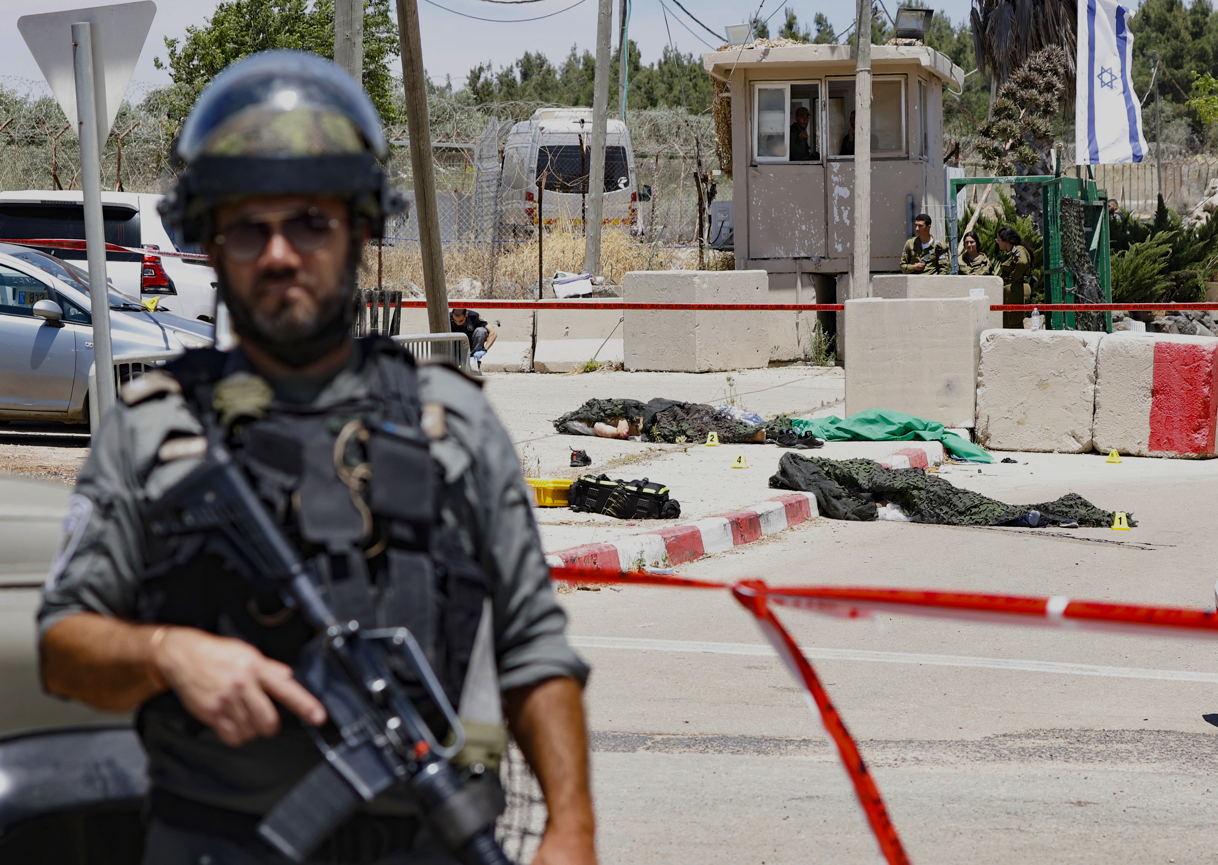 An Israel soldier stands guard in front of the military base of Salem near the West Bank town of Jenin