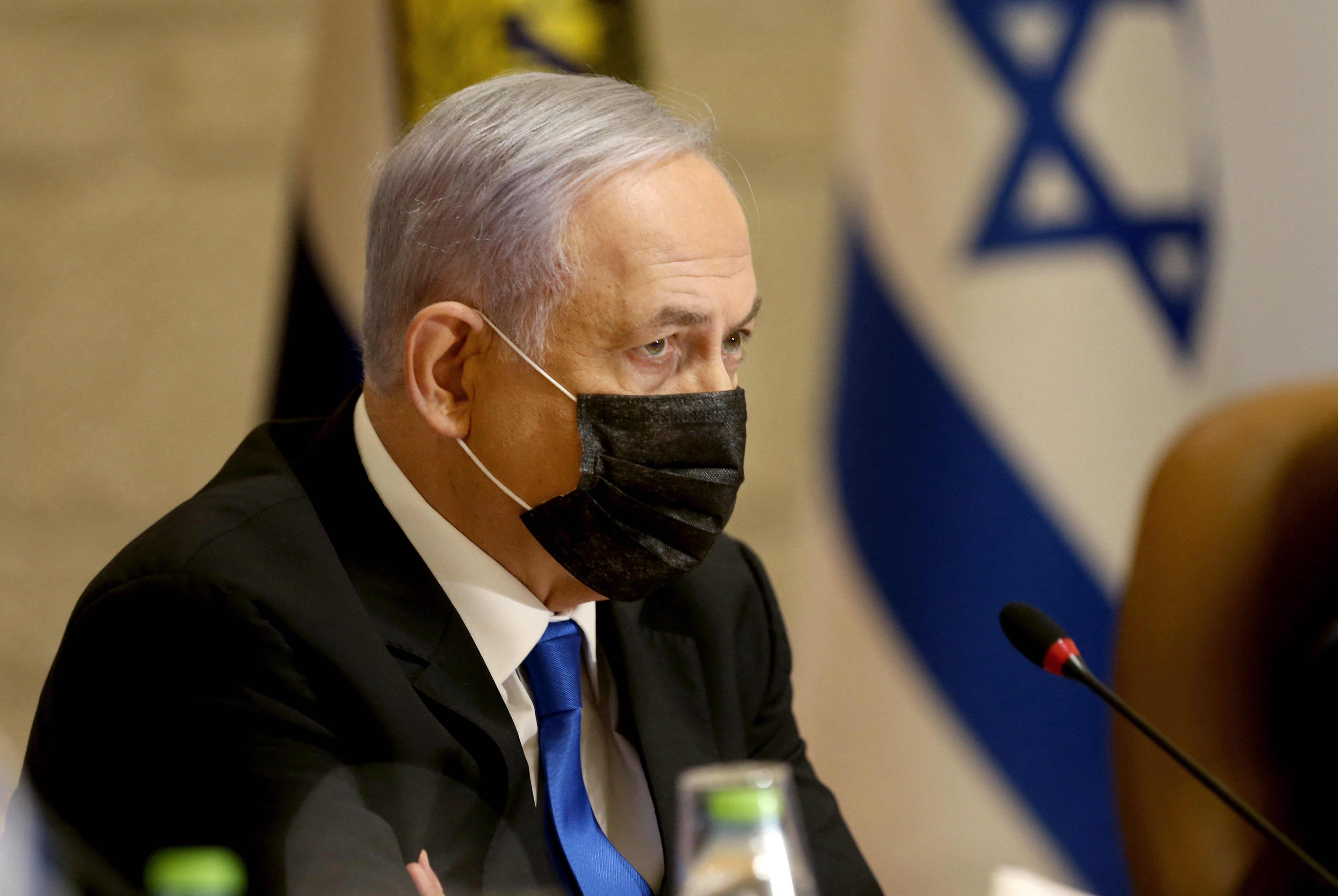 Netanyahu, wearing a mask for protection against the COVID-19 pandemic, attends a special cabinet meeting on the occasion of ‘Jerusalem Day’ at the city’s municipality building on May 9, 2021
