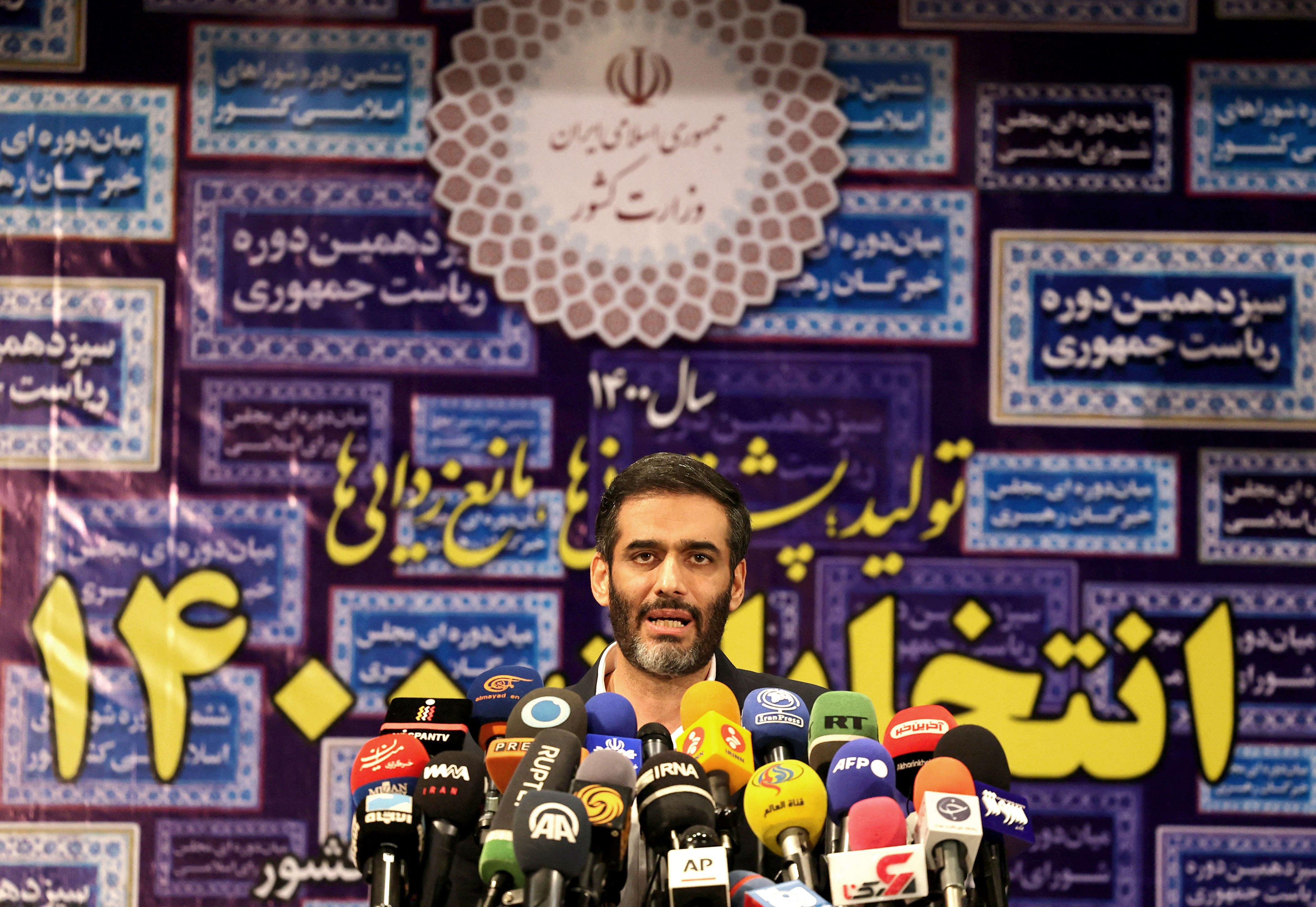 Former Revolutionary Guards’ official Saeed Mohammad registers his candidacy for Iran’s presidential elections at the Interior Ministry in Tehran