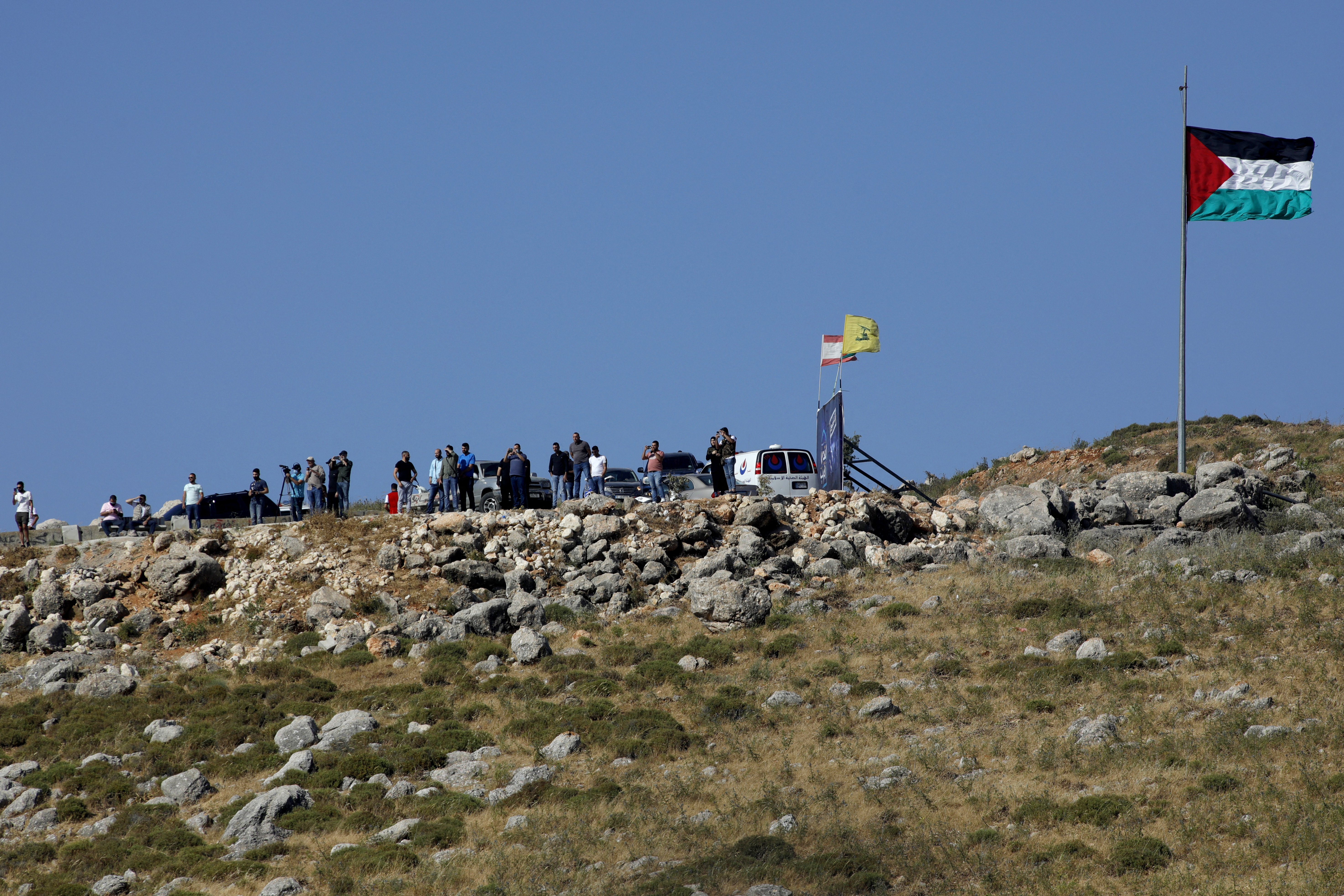The Lebanese protesters had gathered close to the border fence, waving flags, including the Palestinian national flag and the flag of Lebanon’s Iran-backed Hezbollah movement