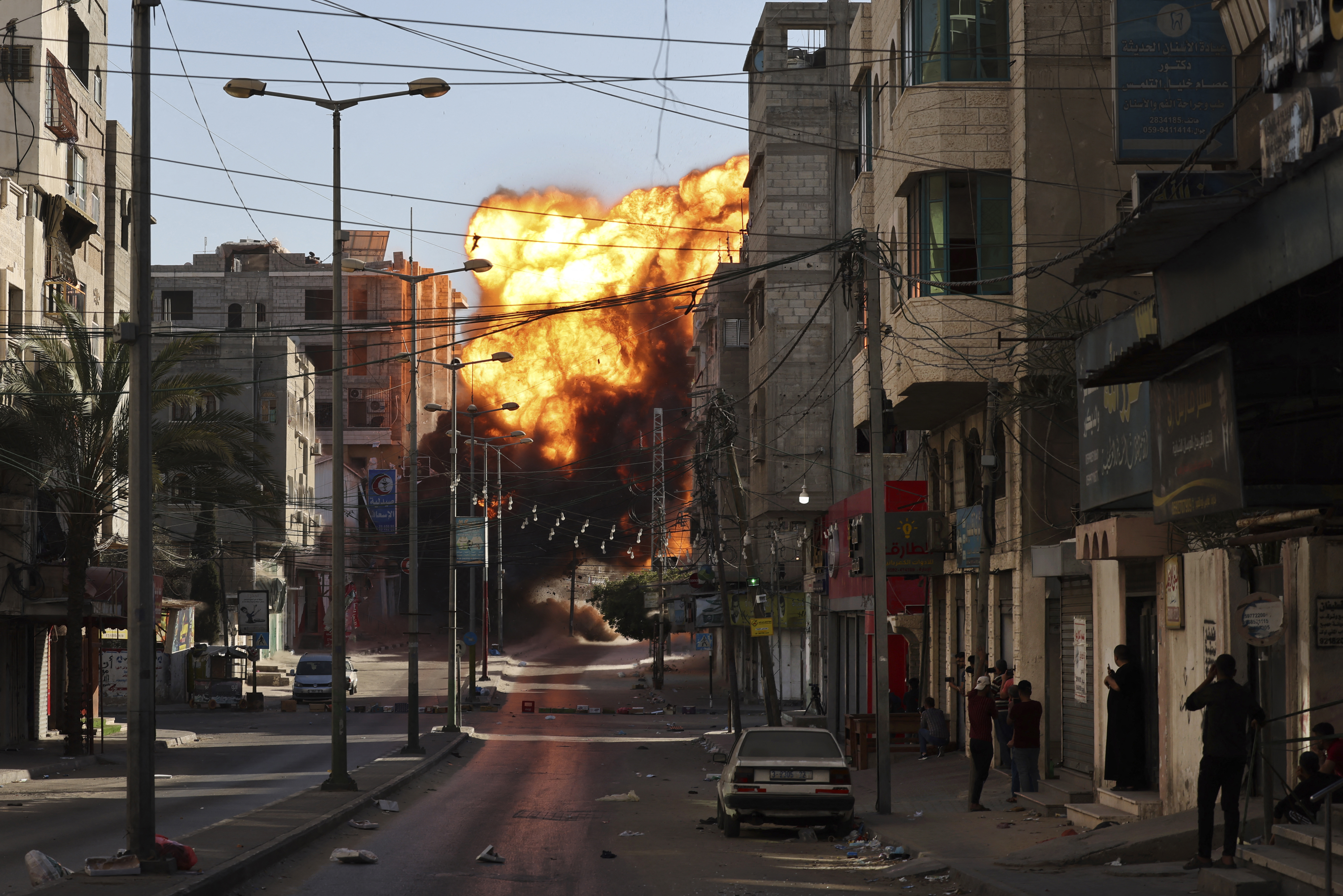 Black smoke billows after an Israeli air raid on Gaza City targeted the Intaj Bank linked to the Hamas movement