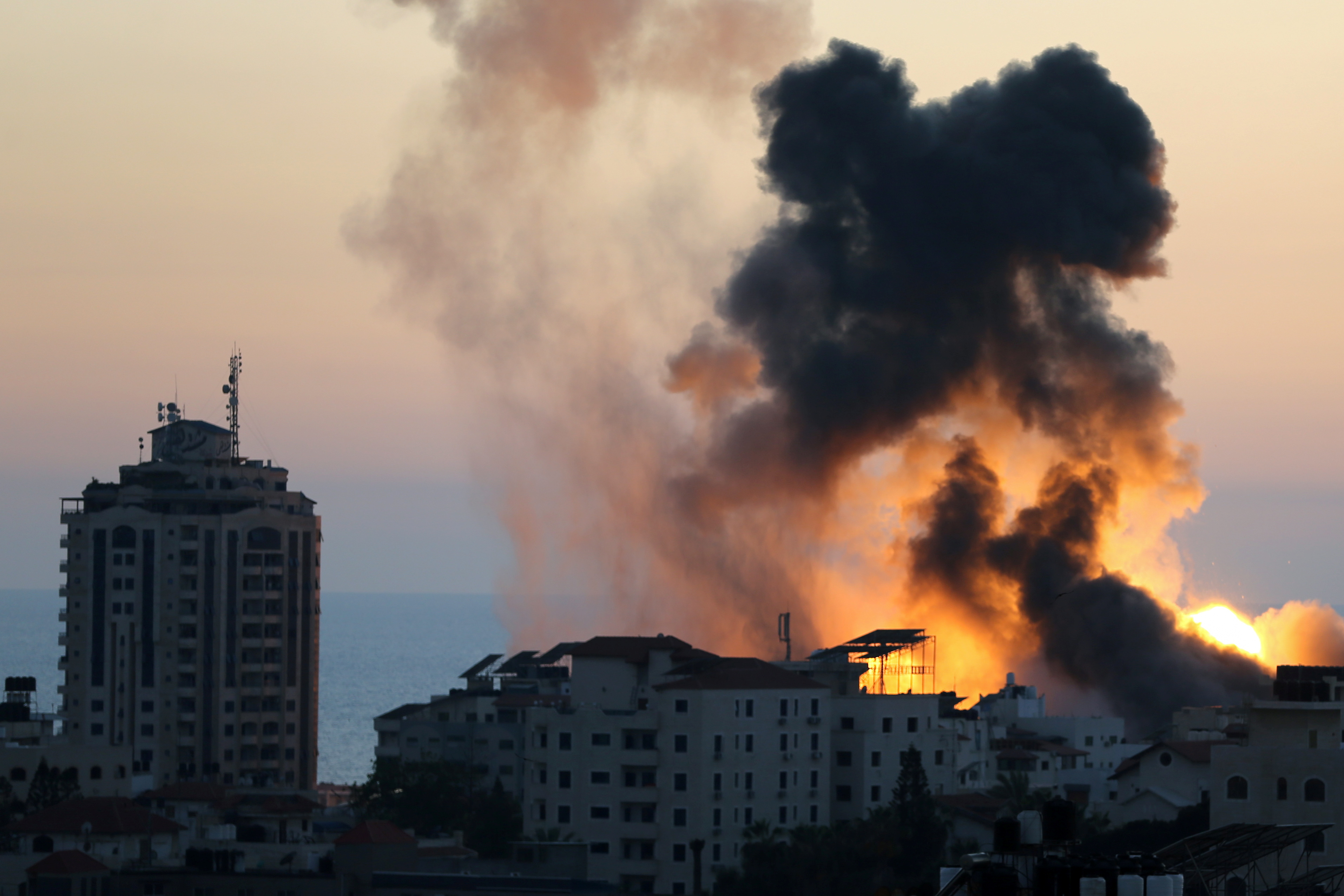 Smoke and flame rise during Israeli air raids on Gaza City