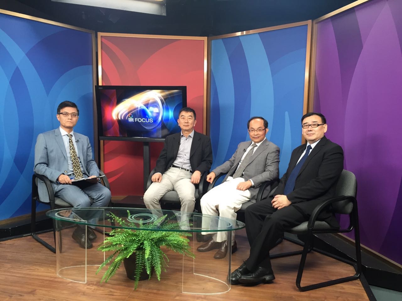 Yang (right) seen during a discussion In Vancouver in 2015. Feng is sitting next to him. The other guest is Xin Lijian, a liberal businessman and educator who helped Yang, and was jailed for more than two years shortly afterwards [Courtesy of Feng Chongyi]
