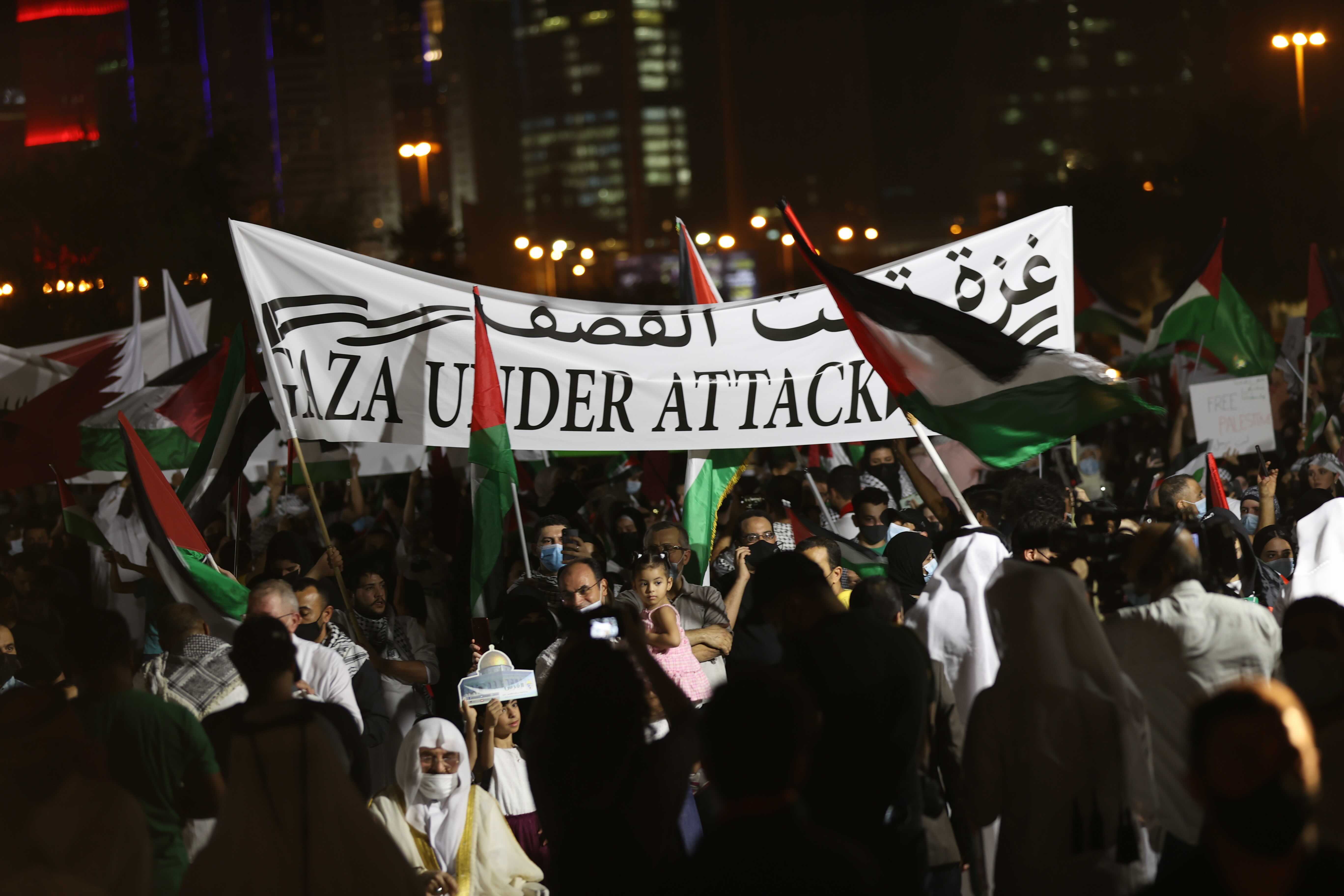 Protesters denounce Israeli attacks on the occupied Palestinian territories