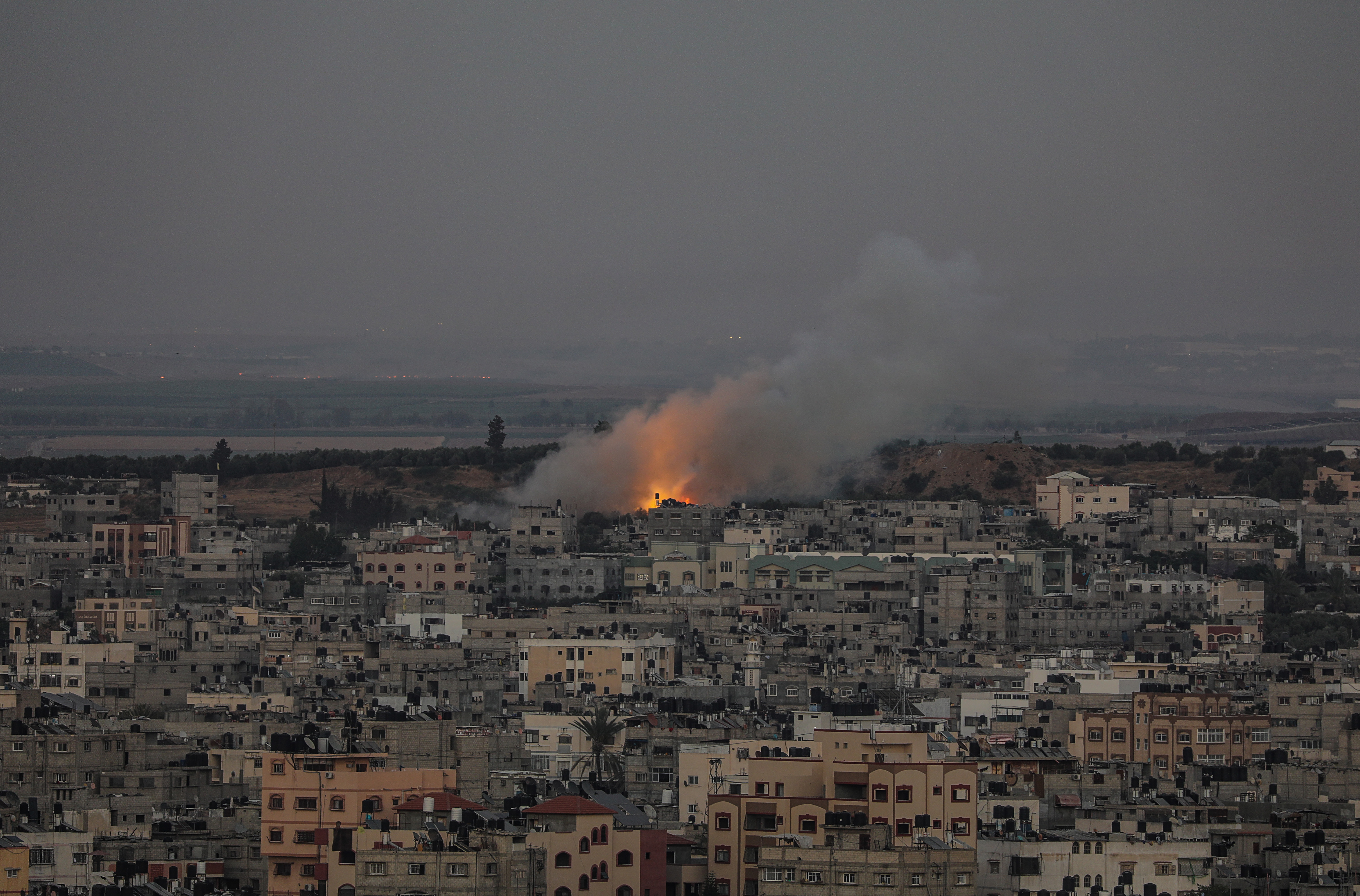 Smoke rises after an Israeli attack in the Shujaiyah neighbourhood in the east of Gaza City