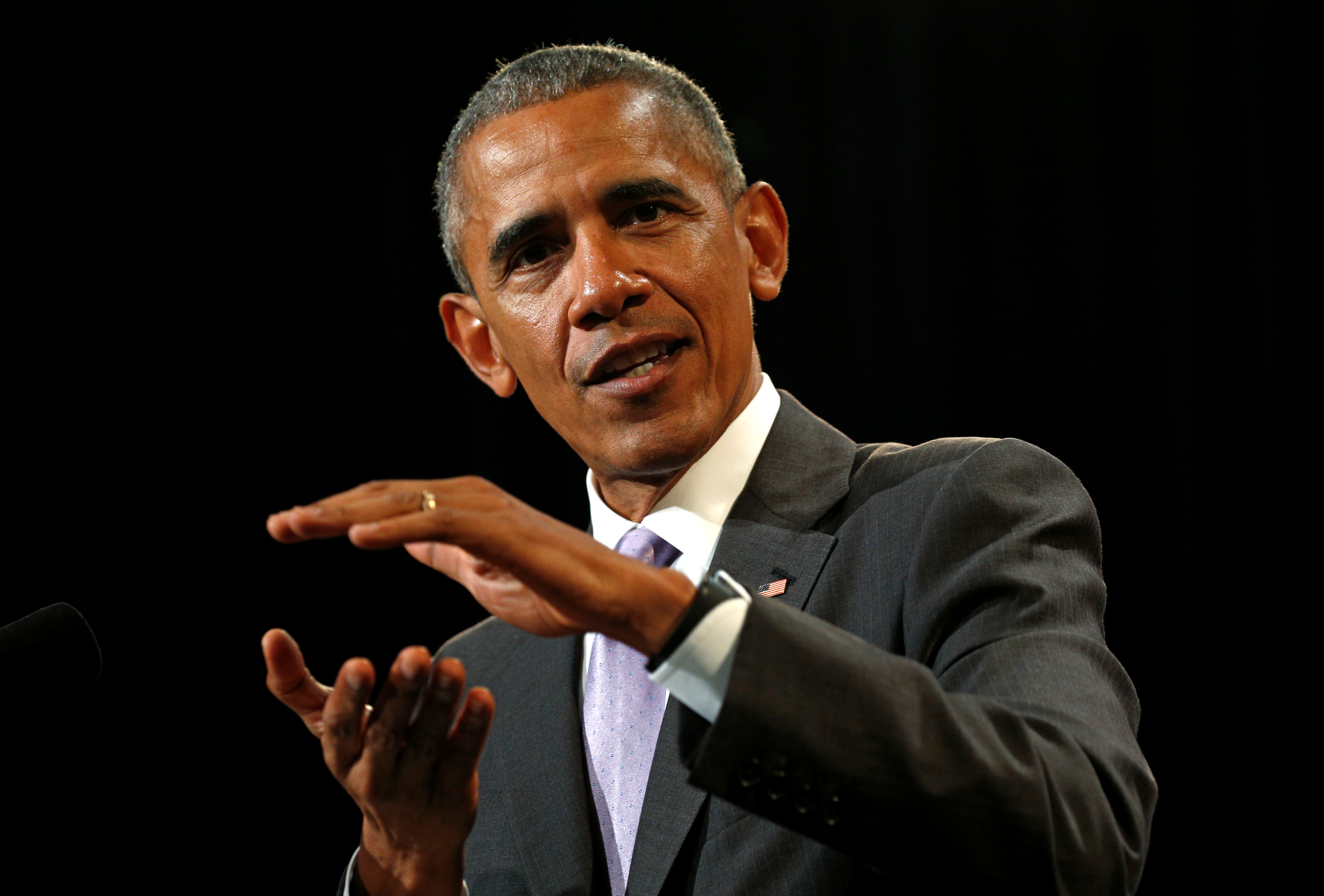 US President Barack Obama speaking about the Affordable Care Act during a visit to Miami Dade College in Miami, Florida