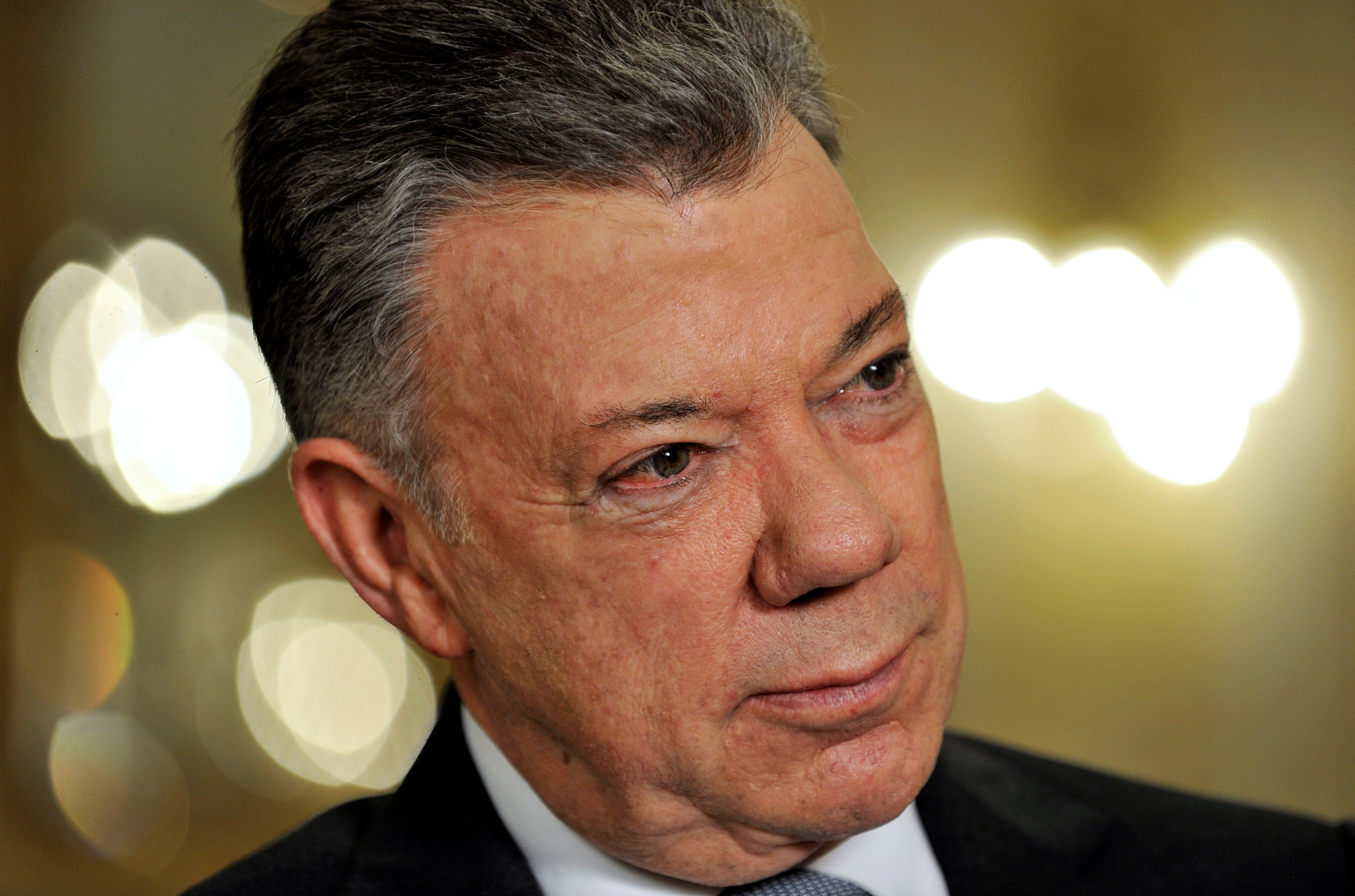 Former Colombian President Juan Manuel Santos at the presidential palace, in Bogota, Colombia on July 30, 2018 [File: Carlos Julio Martinez/Reuters]