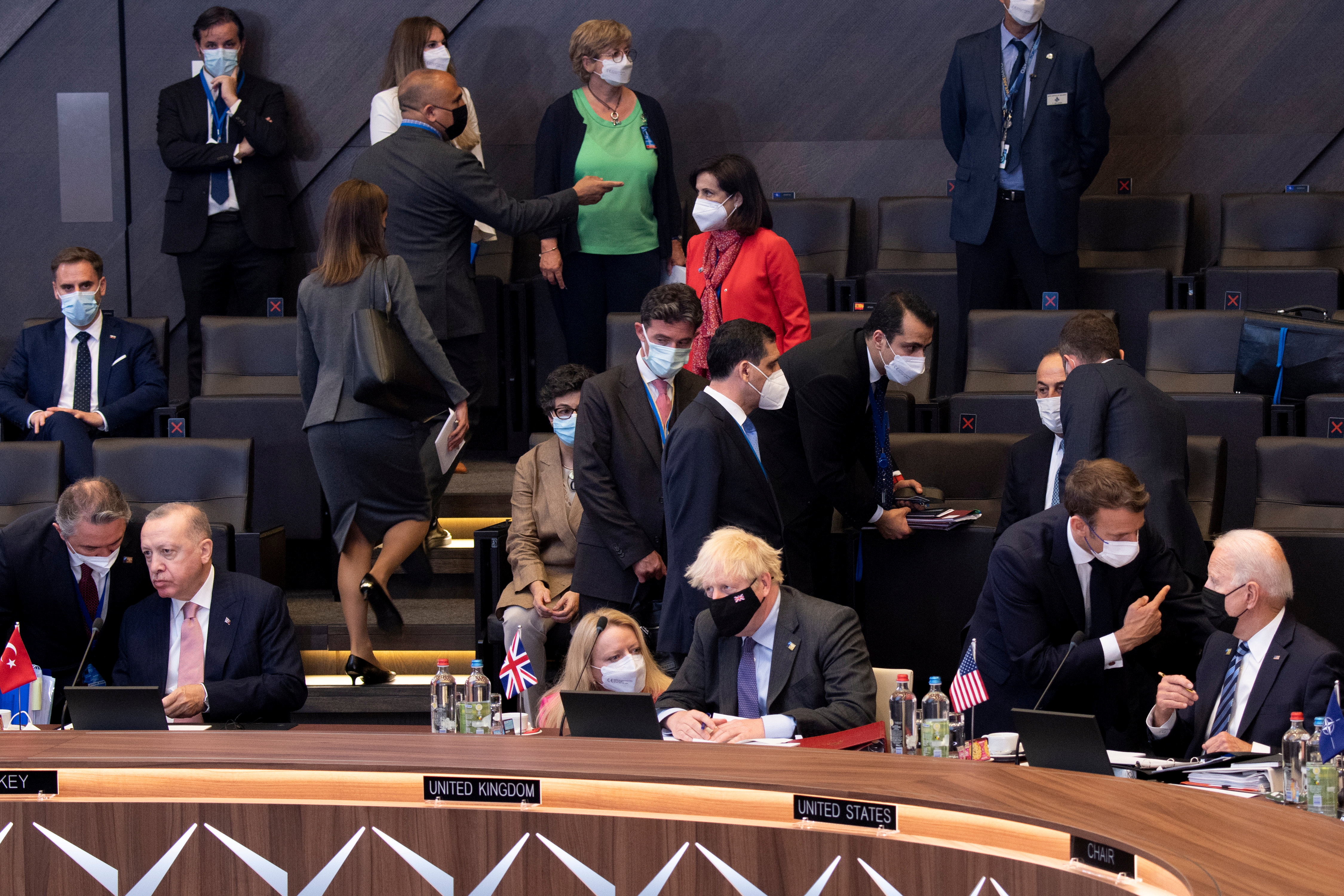 Turkey’s President Tayyip Erdogan, Britain’s Prime Minister Boris Johnson, France’s President Emmanuel Macron and U.S. President Joe Biden attend a plenary session at a NATO summit in Brussels, Belgium, June 14, 2021