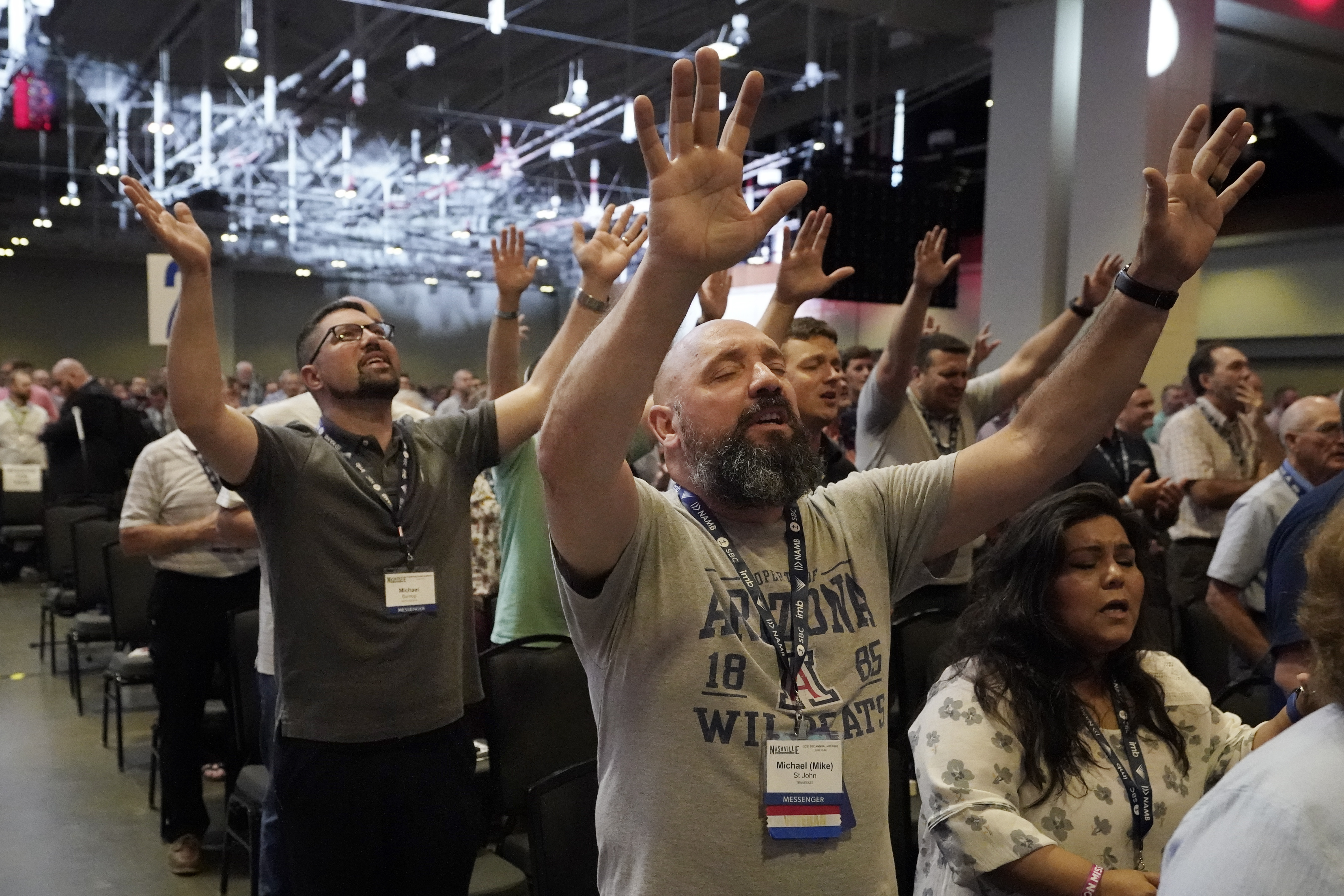 People take part in a worship service during the annual Southern Baptist Convention meeting, June 15, 2021, in Nashville, Tennessee