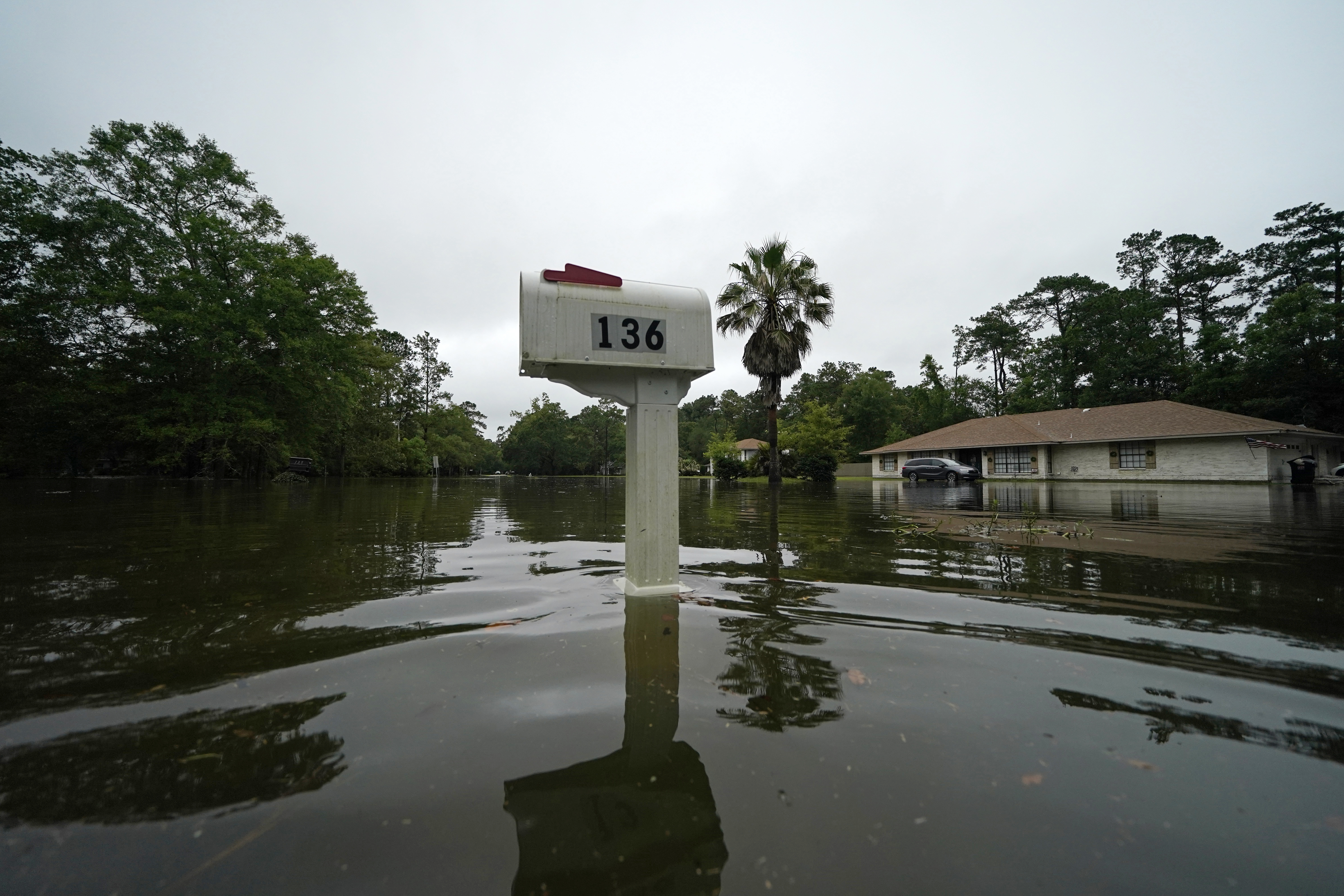 A flooded neighbourhood is seen after Tropical Storm Claudette passed through in Slidell, Lousiana