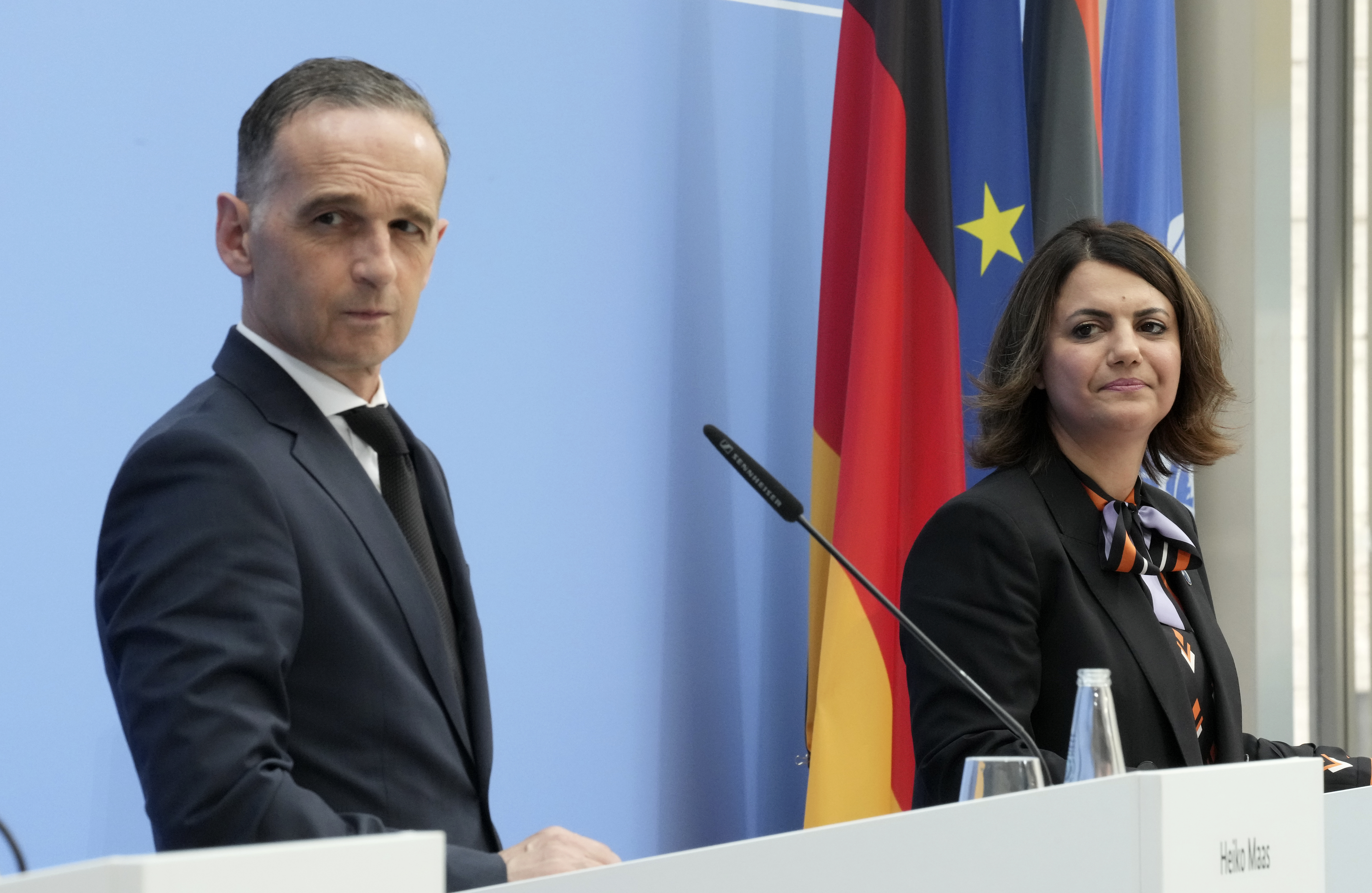 German Foreign Minister Heiko Maas, left, and Libyan Foreign Minister Najla Mangoush attend a joint press conferences part of the 'Second Berlin Conference on Libya' at the foreign office in Berlin [Michael Sohn/Pool/AP Photo]