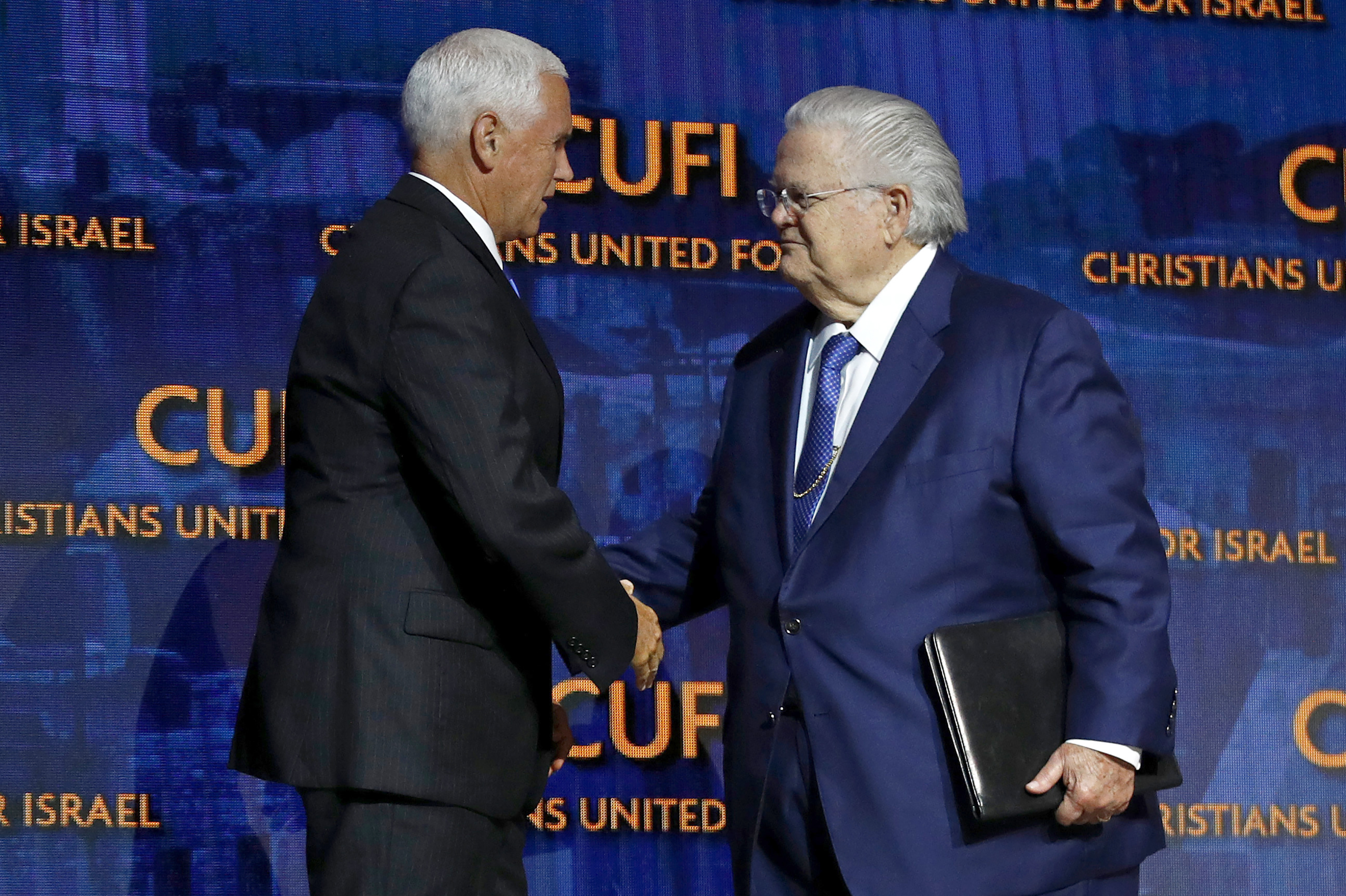 Mega-church Pastor John Hagee, founder of Christians United for Israel (seen with former Vice President Mike Pence) cheered Israel on during the latest conflict even as younger evangelicals drift away from Christian Zionism