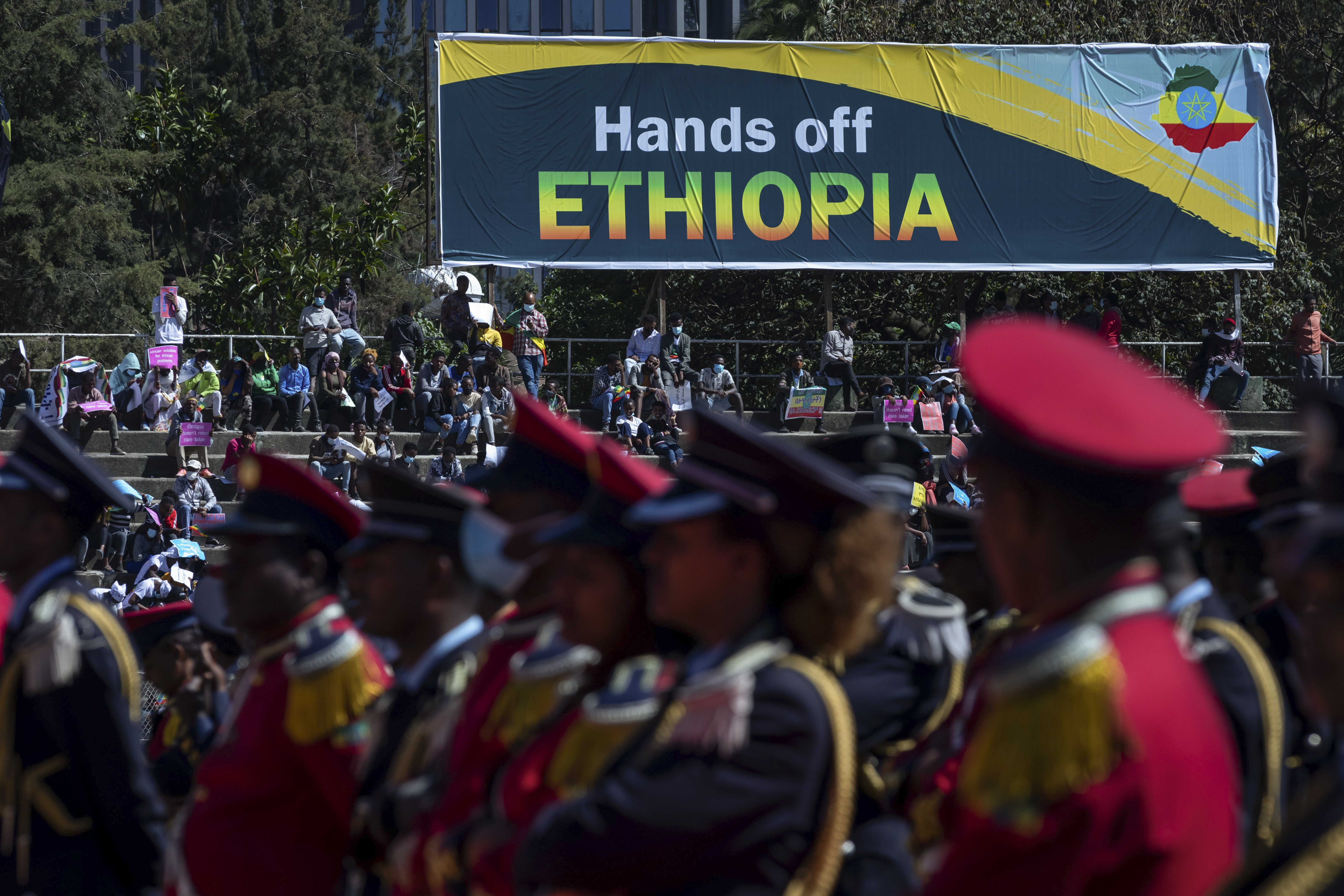 In this file photo Ethiopians are seen protesting against outside interventions in the conflict in the country's northern Tigray region, at a demonstration held at a stadium in the capital Addis Ababa, Ethiopia on May 30, 2021 [AP Photo/Mulugeta Ayene]