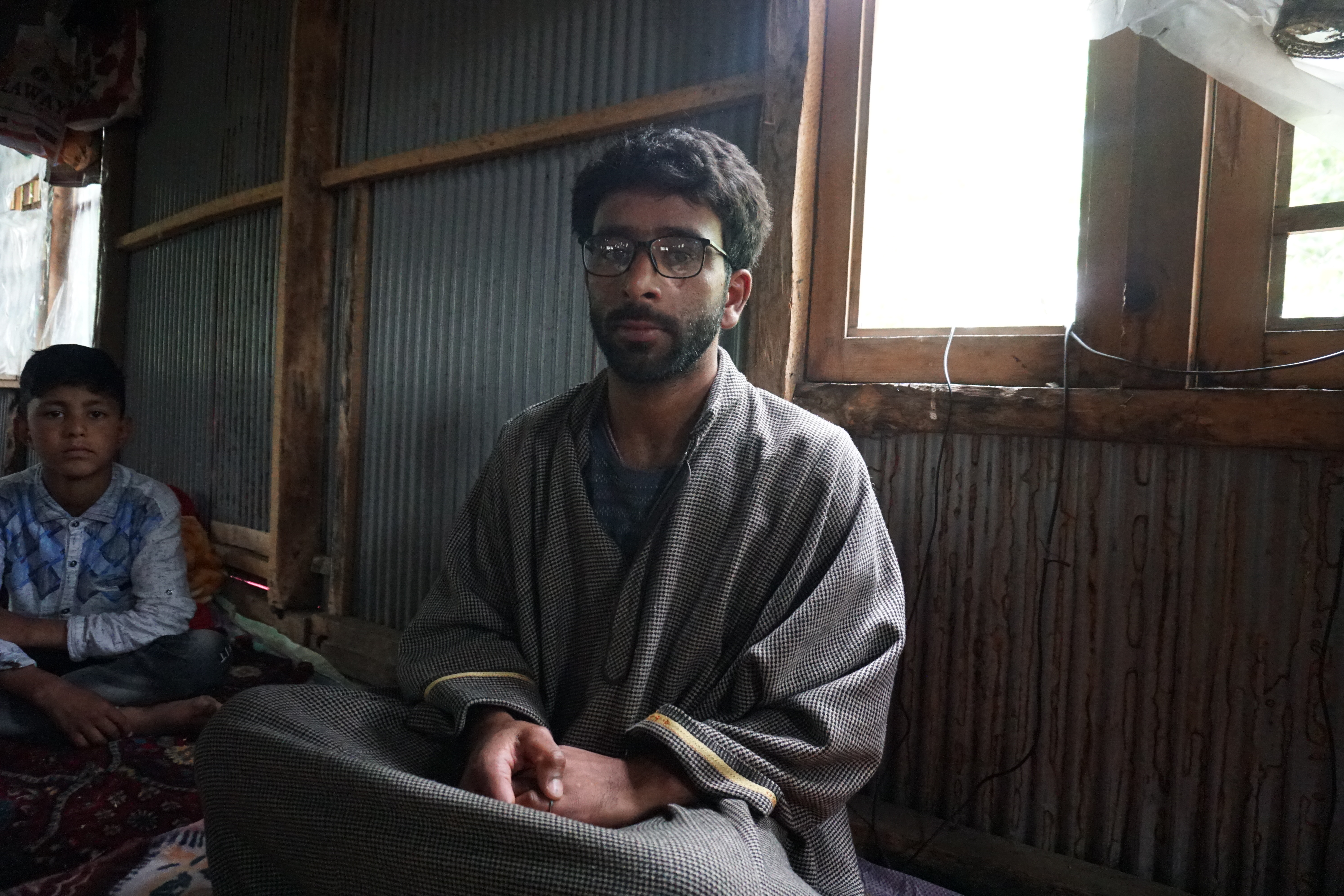 Muhammad Abbas mourning the death of his best friend, in Kulgam