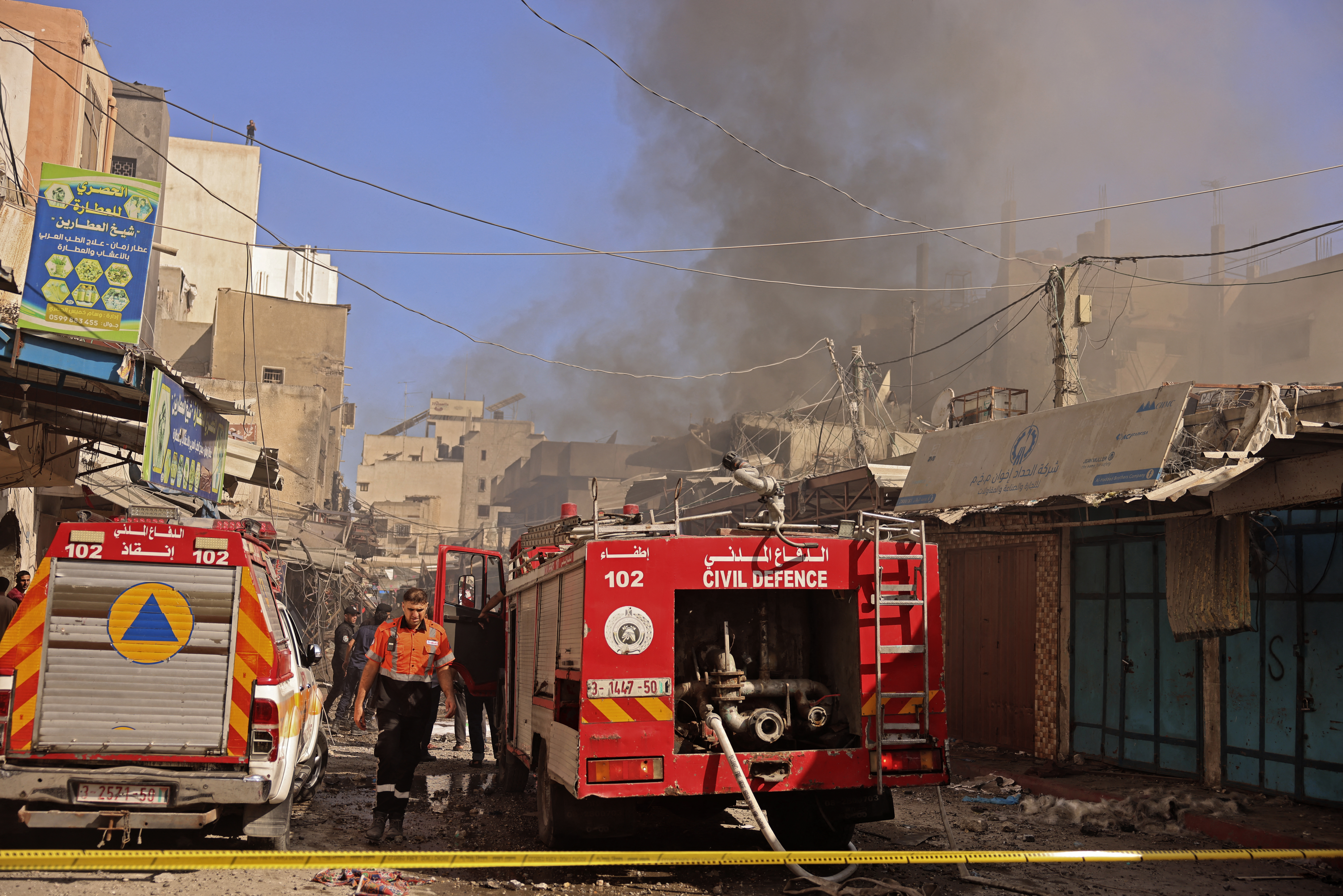Witnesses said an explosion caused by the fire damaged many shops